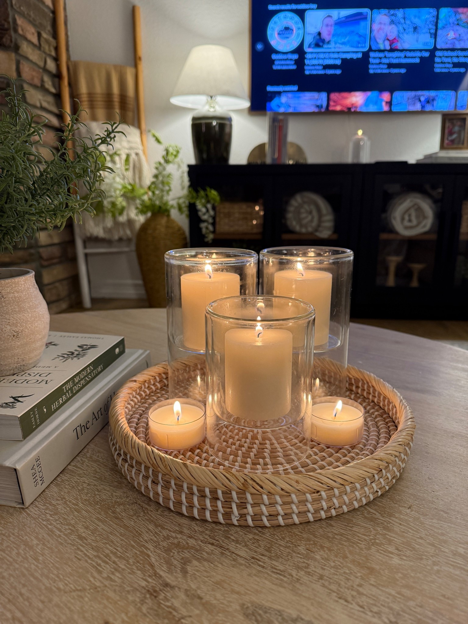Easy hygge living room idea!! Lots of unscented candles and hurricane vases. 

Sarah Joy, cozy, living room, cozy home 

#LTKHome #LTKSaleAlert #LTKdayinmylife