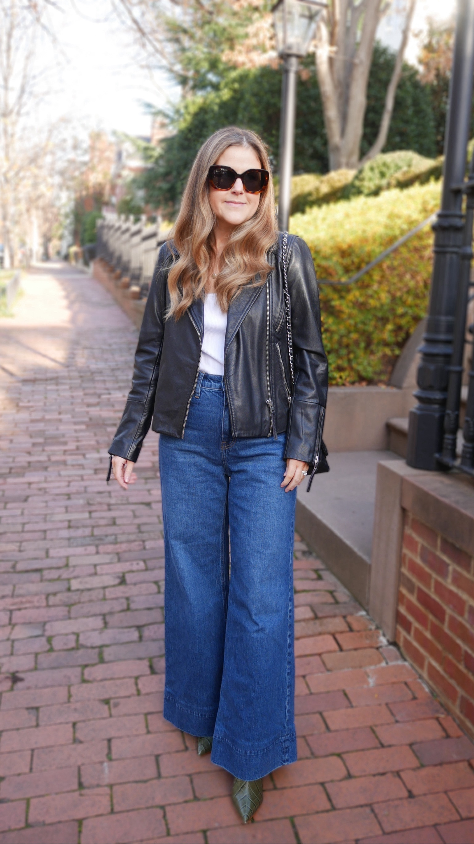 Date night outfit! Pair wide leg jeans with a leather jacket for an easy and comfortable date night look. The boots I tagged as exact are my same boots but in black. Mine are green and sold out. 

#LTKstyletip #LTKSeasonal