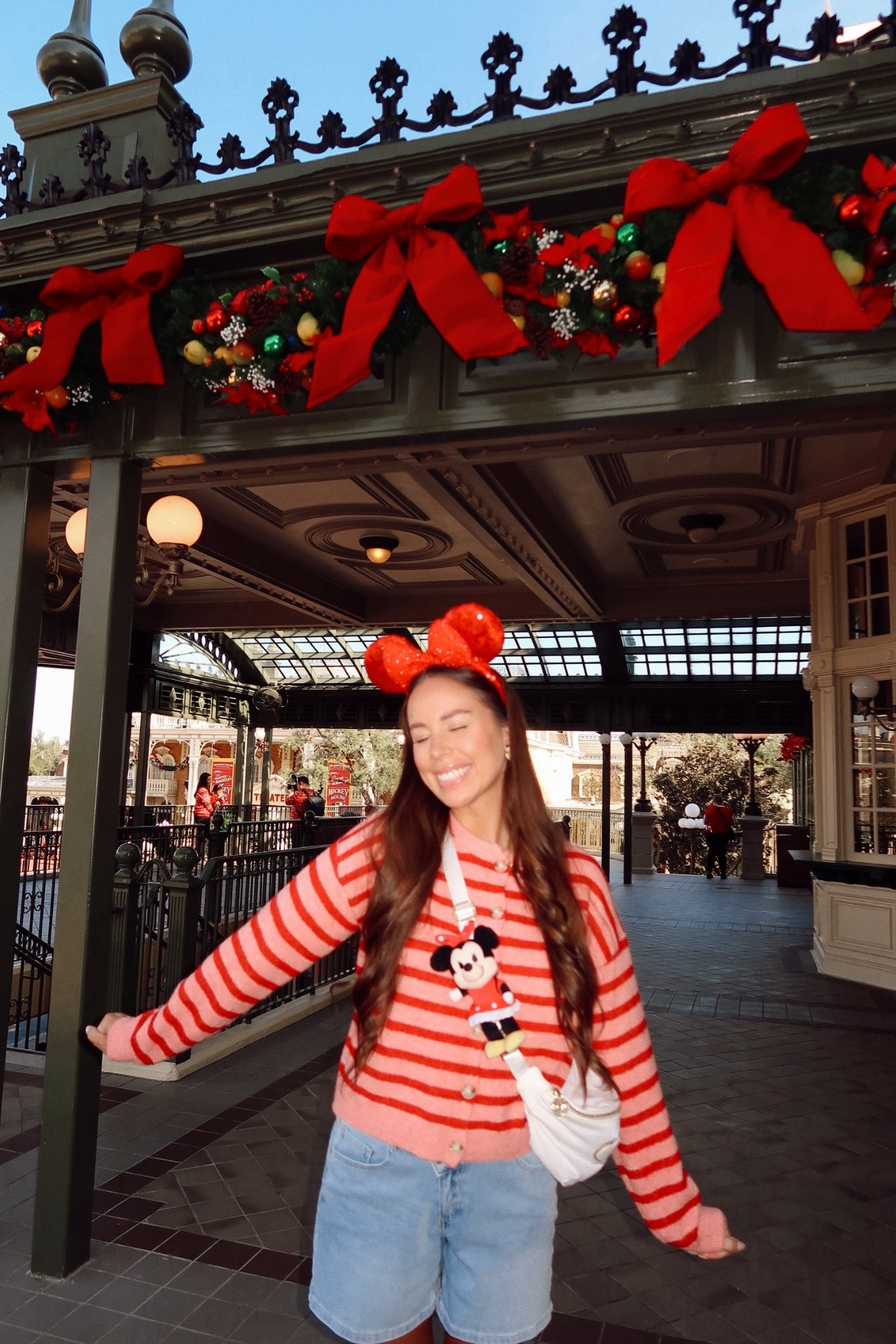 Disney Christmas OOTD❤️ Disney outfit, Disney style, Disney girl, Disney aesthetic, Amazon striped sweater cardigan, denim long mom shorts, comfy jean shorts, chunky Reebok charge sneakers, jumbo Stoney clover Fanny pack, Disney bag, red sequin Mickey ears, Disney Nuimos, Amazon sunglasses, Disney accessories, Disney jewelry, winter outfit inspo, Disney outfit ideas #disney 



#LTKHoliday #LTKootd #LTKSeasonal