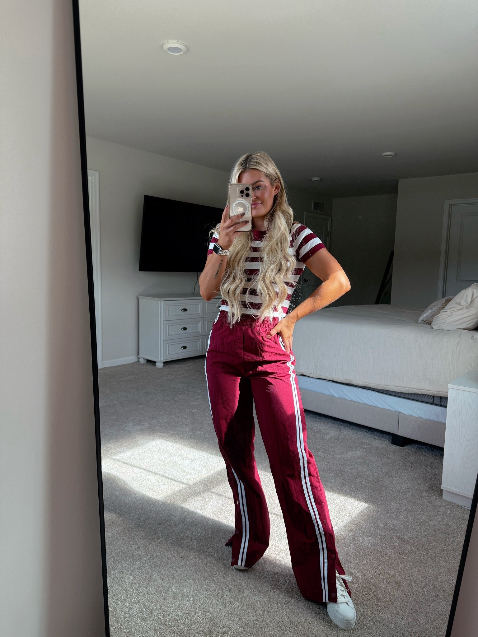 Trendy track pants paired with a striped tee and platform Keds sneakers 

#LTKSeasonal #LTKFindsUnder50 #LTKStyleTip