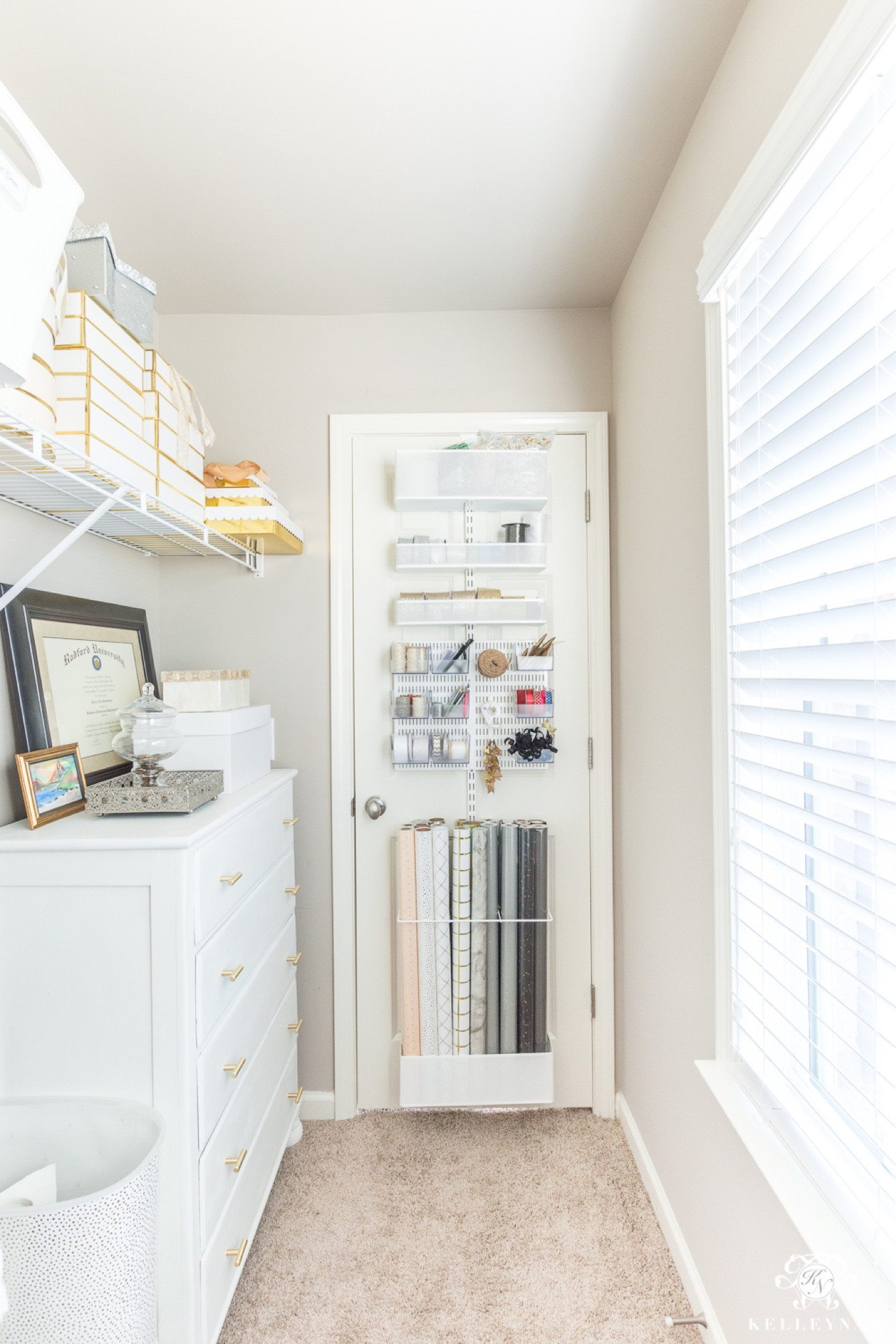 This Elfa over the door gift wrap organization solution holds all of your gift wrap rolls, ribbons, embellishments and more! I love that it keeps these items easily accessible and takes up no extra space. home storage gift wrap storage home organization Elfa solution closet storage closet organization office organization gift wrap organization 

#LTKhome #LTKfindsunder50 #LTKsalealert