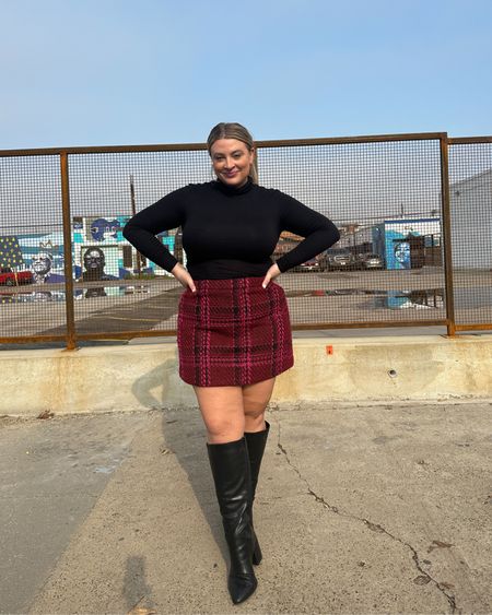 Plus size winter outfit idea // boots are torrid but I have similar wide calf knee high boots linked here. Skirt is 16 from Eloquii (sized up) and black turtle neck is universal standard size small (true to size per their size chart) 

#LTKcurves #LTKunder100 #LTKSeasonal