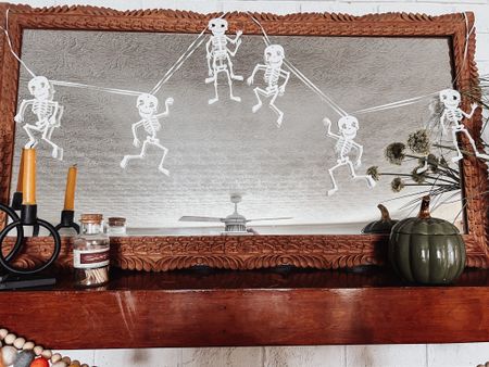 White glitter dancing skeleton garland. $4.98 perfect to add a touch of Halloween spirit. #skeletondecorations #under20 #halloweendecorations #minimalistdecor #halloweengarland

#LTKSeasonal #LTKhome #LTKHalloween