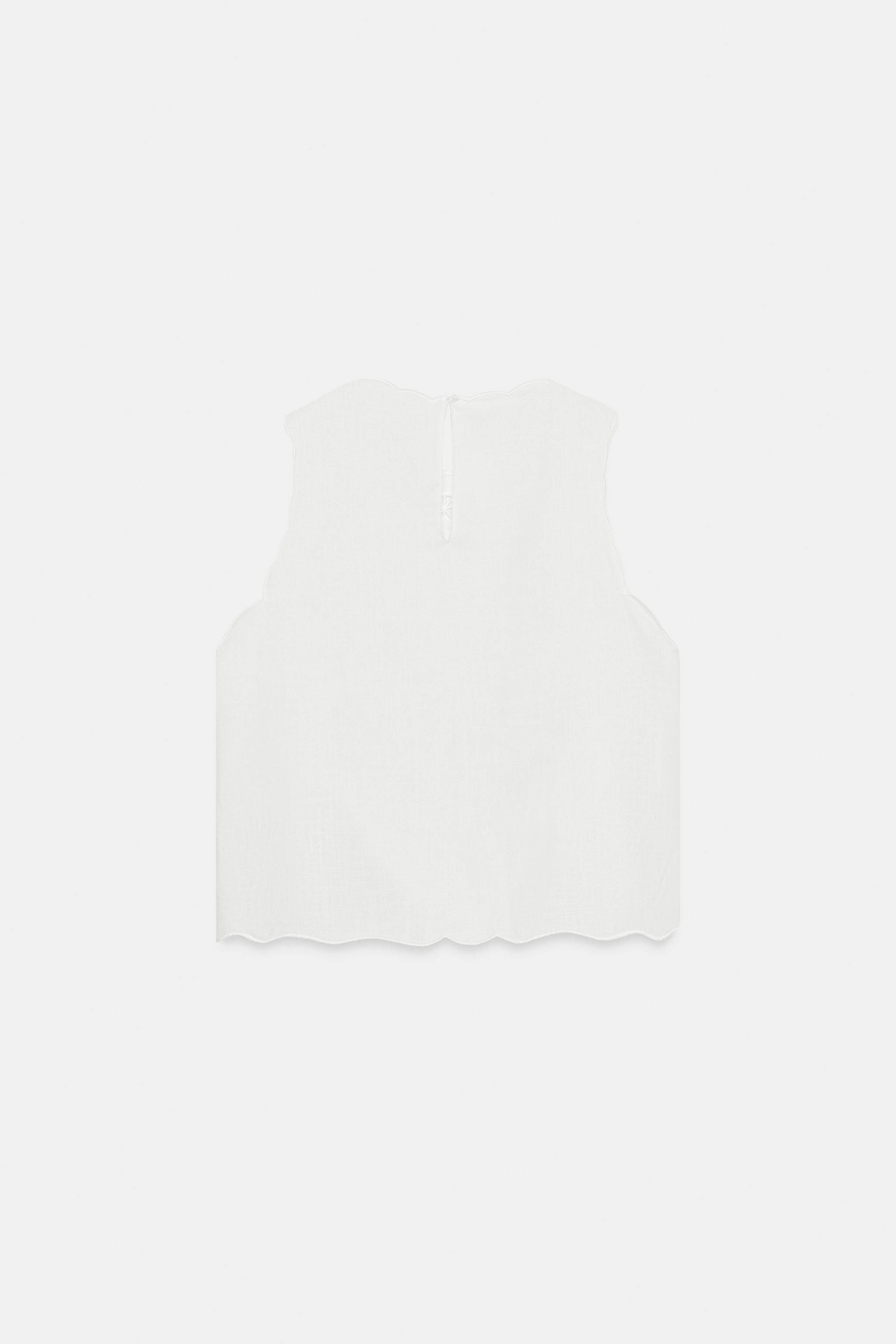 ZARA WOMAN COLLECTIONShirt made from a ramie blend. Round neck and sleeveless cut. Featuring matc... | Zara US