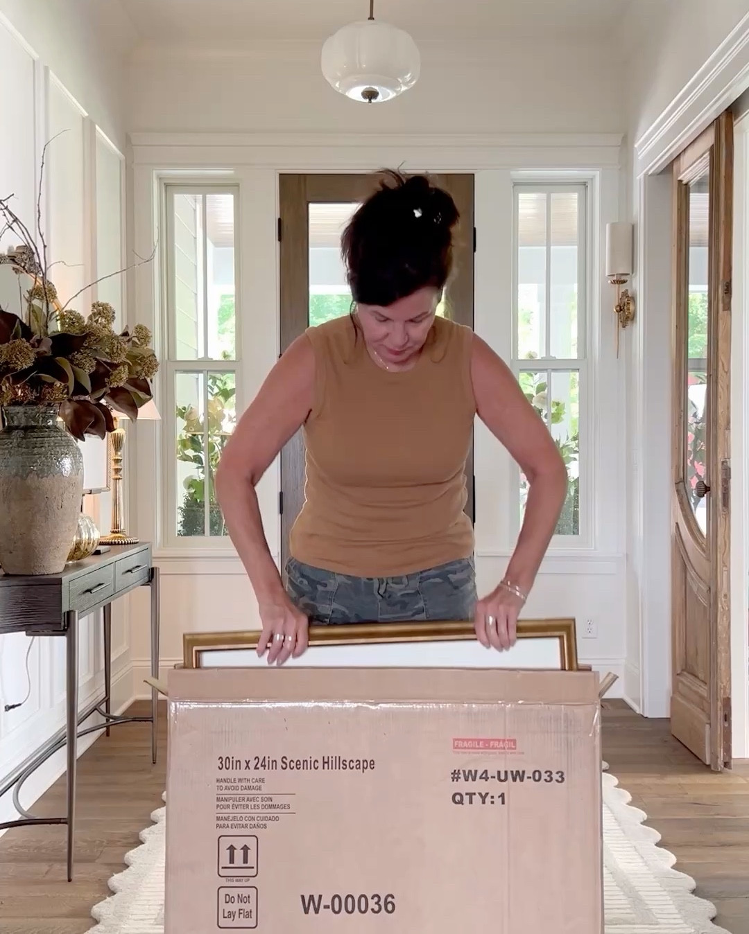 TIP TUESDAY — How high should I hang my art? 
At eye level. Your eyes should fall at the middle of the artwork. 

A good average for hanging art and photos is that the middle should be 57-60 inches from the floor. If you’re tall or have 10’ plus ceilings go a few inches higher. When hanging a larger collection of pictures, treat them as one large piece, centering the grouping at that same 57-60 inch measurement. My preference is 2-3 inches between art, when hanging multiples. Eye level is so easy to remember. If you’re very petite, use inches. I’ve link some of the art I have in my home as well as other favorites. 