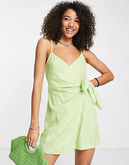 ASOS DESIGN wrap cami tie side linen mini sundress in apple green | ASOS (Global)