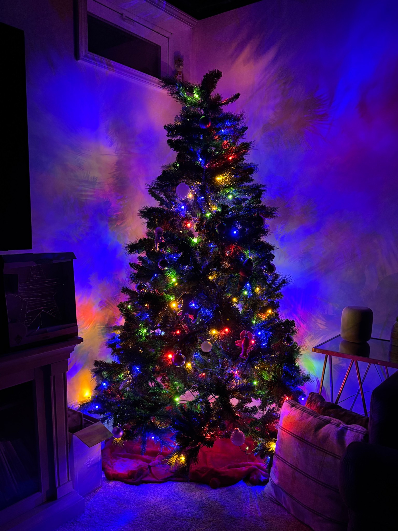 Best pre-lit affordable artificial tree! Adds the perfect touch to our basement with so many different light settings 🎄❤️

#LTKSeasonal #LTKHoliday #LTKHome