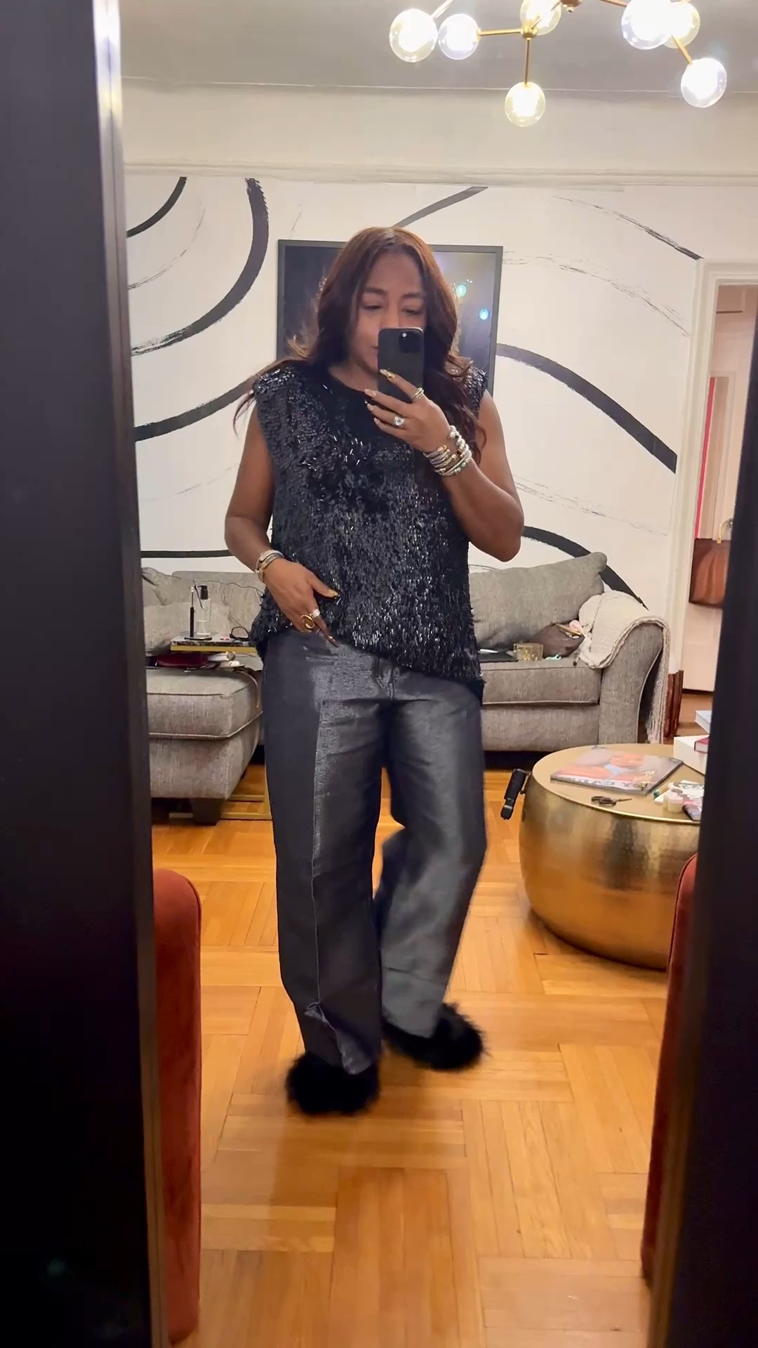 Did I just find the perfect Thanksgiving living-room fit?

Metallic jeans that fit like real denim, a strong-shoulder sequin tee that looks elevated without any effort, and yes… I wore it with fur slippers. The plush kind with the little sparkle across the top. It’s the easiest holiday outfit formula when you want to look luxe, polished, and intentional without giving up comfort. Shine on top, wearable texture on the bottom, and a festive look you’ll actually enjoy wearing.

Style tip: Pull the look together with accessories that carry the same metallic tone as the sequins. In this case, silver details echo the shine in both the top and the jeans so the whole look feels cohesive, elevated, and intentionally festive.

#LTKFindsUnder100 #LTKHoliday #LTKootd