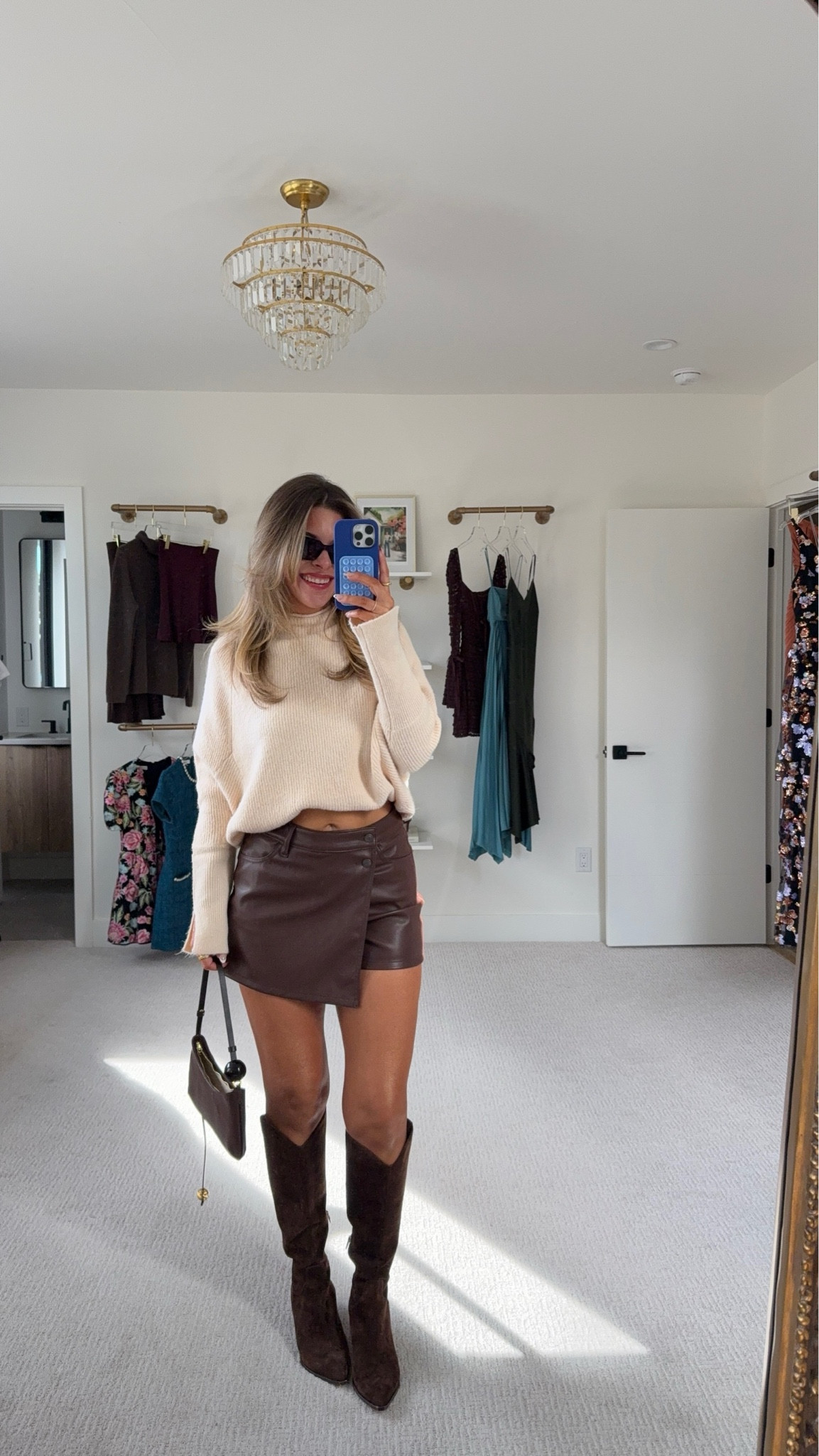 Walmart capsule collection brown leather skort styled for fall with cream mock neck top. 

Wearing a small in all  

#LTKSeasonal #LTKFindsUnder50 #LTKStyleTip