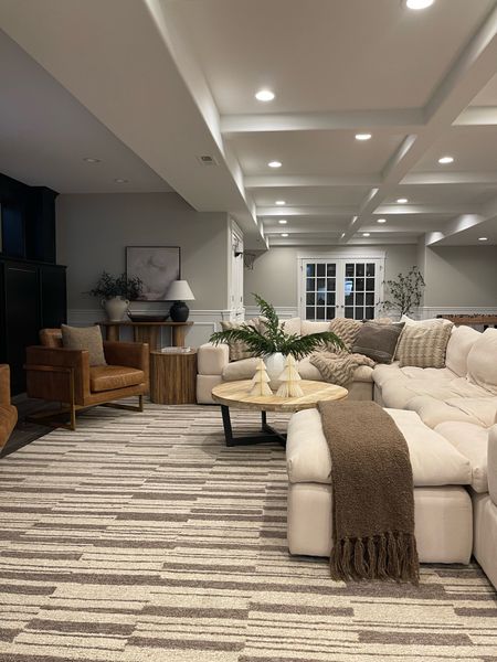 Basement views! Our sectional is modular and you can adjust it however you want. 

Our coffee table is from Article and cannot be linked (linking similar). Chairs are Edloe & Finch, and cannot be linked either. 

Basement, area rug, sectional, holiday, 

#LTKHoliday #LTKhome #LTKsalealert
