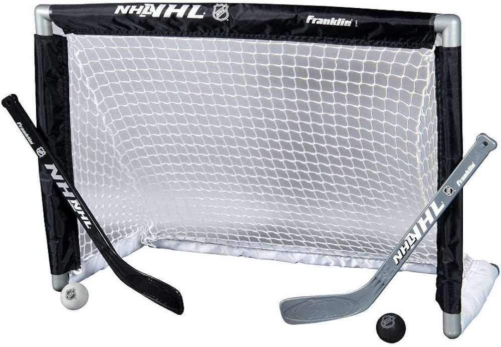 Franklin Sports NHL Youth Mini Hockey Goal + Stick Set - Kids Knee Hockey Goal, Sticks + Foam Min... | Amazon (US)