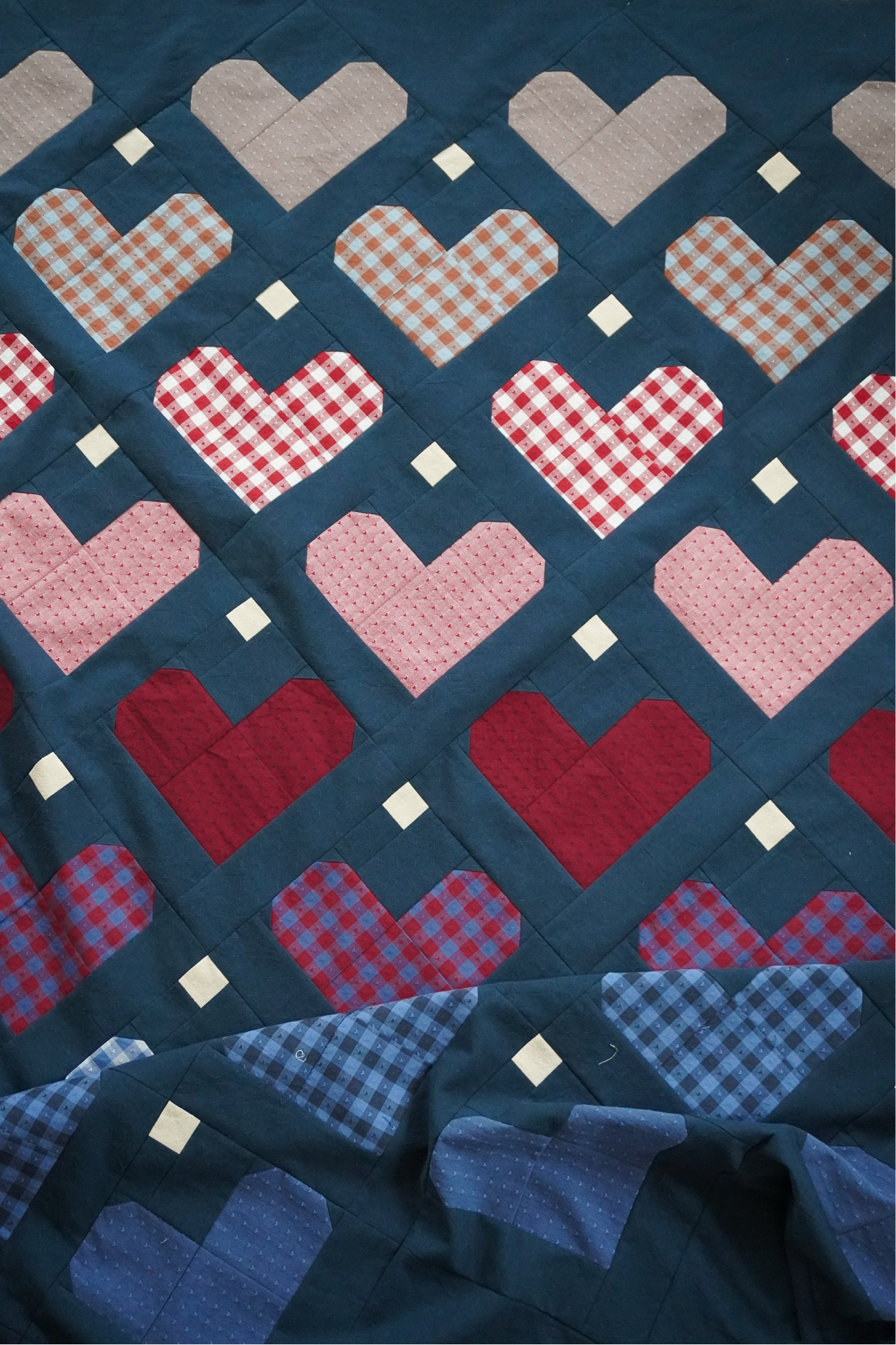 Heart Gems quilt pattern sewn up with Fableism Queen of Hearts wovens.  Background is Sprout Wovens in midnight by Fableism.  
