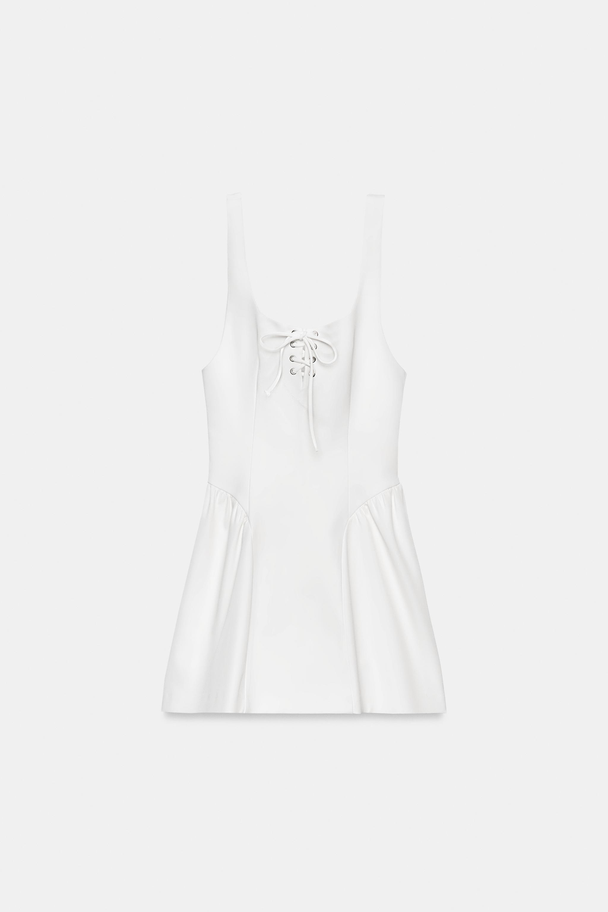 Model height: 178 cmMini dress with a square neckline and straps. Featuring crossover lace-up det... | Zara UK