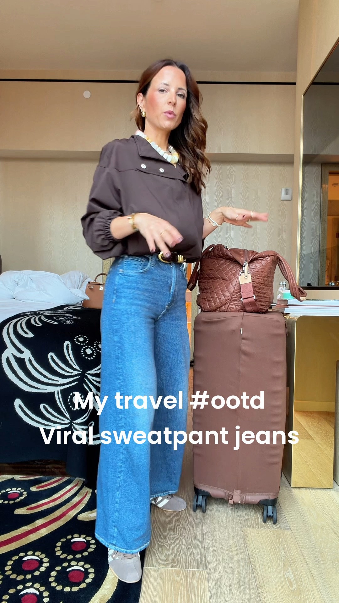 My airport outfit of the day. Travel outfit. Elevated casual outfit. rb Miramar Sofie Ankle-Length Pants in 23 (most people size down 1 in these and that’s what I did). Linking full length option, too! Chocolate brown balloon jacket in quick dry material, size XXS. Seamless bodysuit in XS. Brown adidas - I sized down half a size. Beis luggage sets with matching covers. MZ Wallace quilted tote in medium, color is ‘terracotta’.
