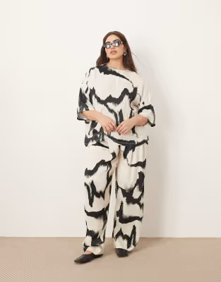 ARRANGE Curve satin shirt and straight leg pants set in black and white abstract print | ASOS (Global)