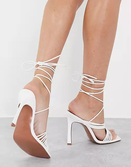 ASOS DESIGN Wide Fit Nest strappy tie leg heeled sandals in white | ASOS (Global)