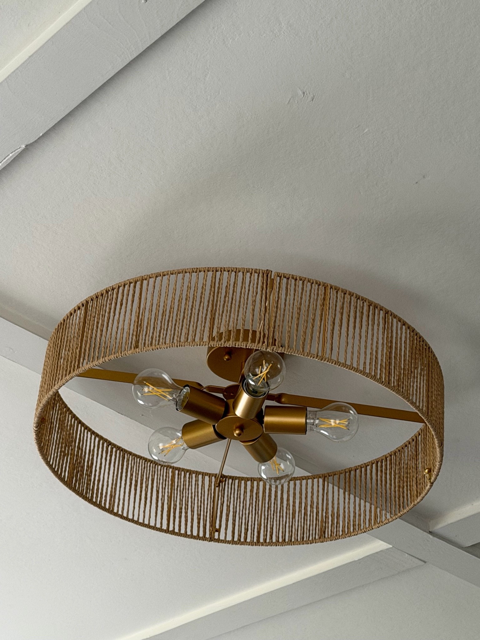 This 24” natural rattan flush mount is one of those lighting pieces that instantly warms up a space. 🤍

The woven rattan shade paired with the antique brass finish creates the perfect blend of organic texture and timeless style. I love that it makes a statement while still feeling light and airy.

Perfect for an entryway, hallway, bedroom, living room, or even over a kitchen island for that cozy, designer-inspired look.

#LTKHome