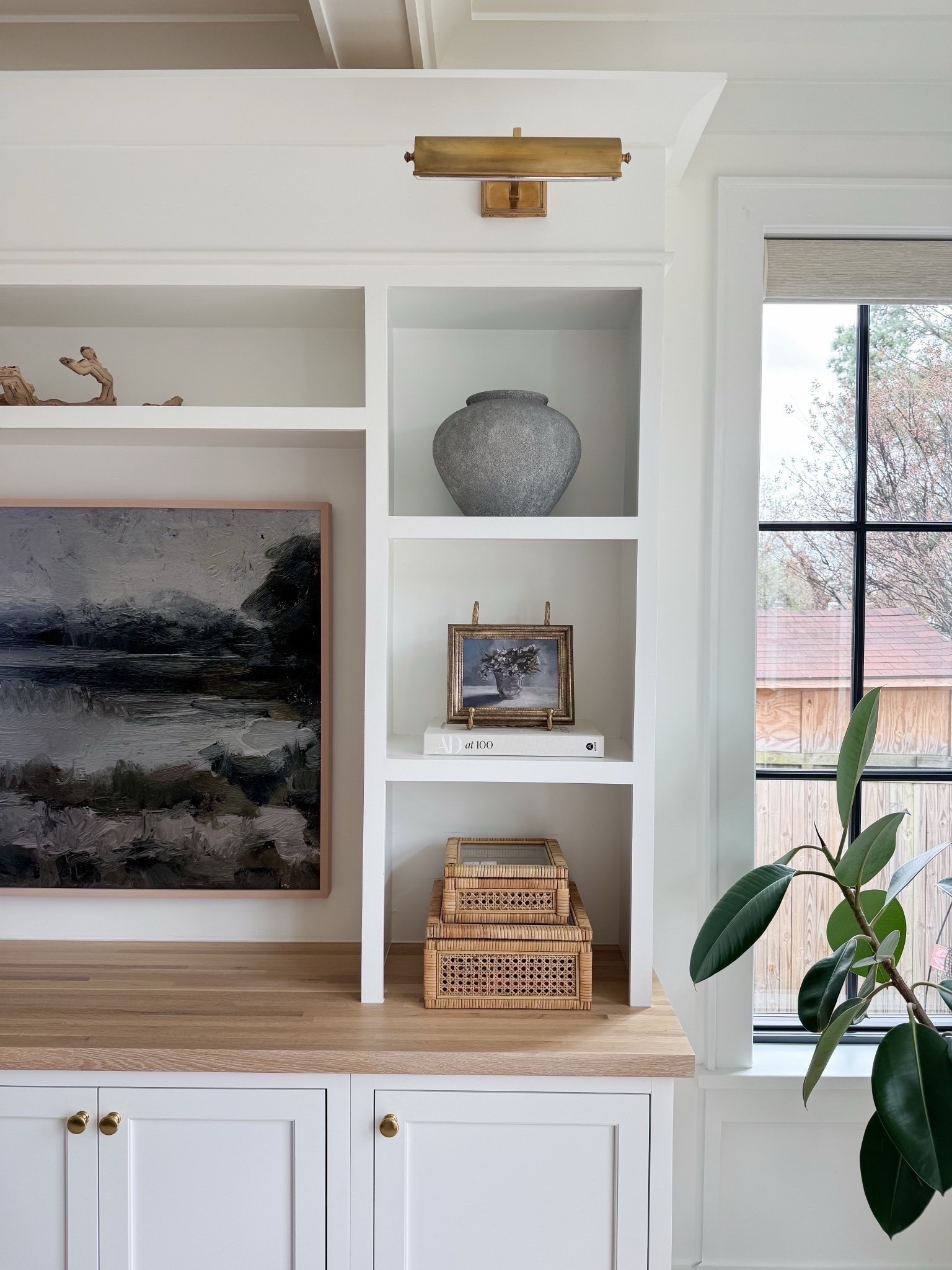 Modern coastal shelf decor. White media center. Our media center was custom-made, but I’ve linked a few similar that I love.

#LTKHome #LTKStyleTip #LTKFindsUnder100