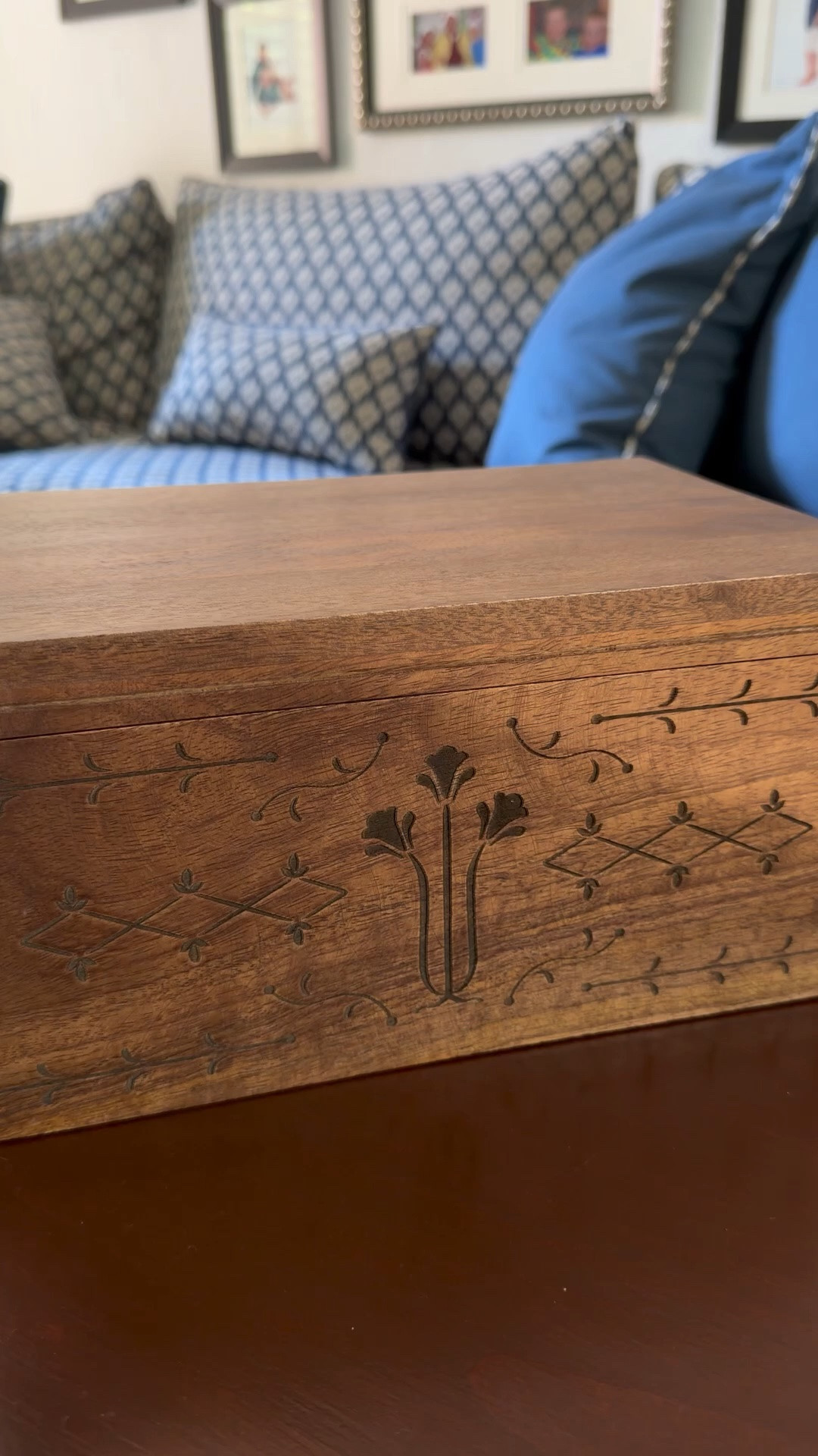 I love decor that actually does something. 
This little wooden box keeps the remotes and loose items tucked away while still looking beautiful on the table — one of those small changes that makes a room feel calmer without trying too hard.

The wood detailing and pretty hinges are what sold me.

Pretty, not perfect.

#LTKHome #LTKMothersDay