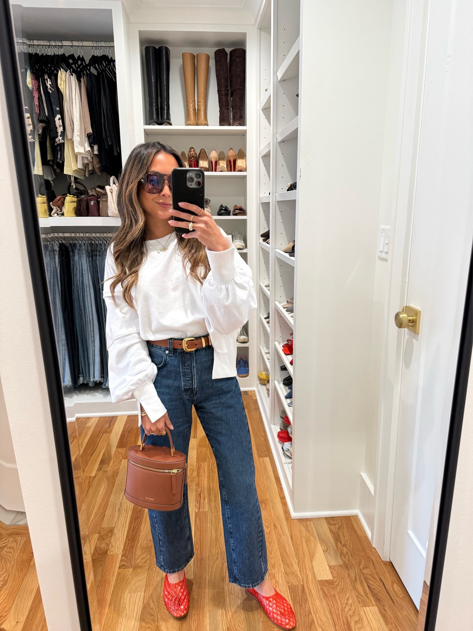 Casual cute and laid back outfit! 
Top: S in white 
Jeans: 23P in McKinney wash 
Flats: 5 in red 
Belt: XS in raw umber

#LTKOver40 #LTKPetite #LTKootd
