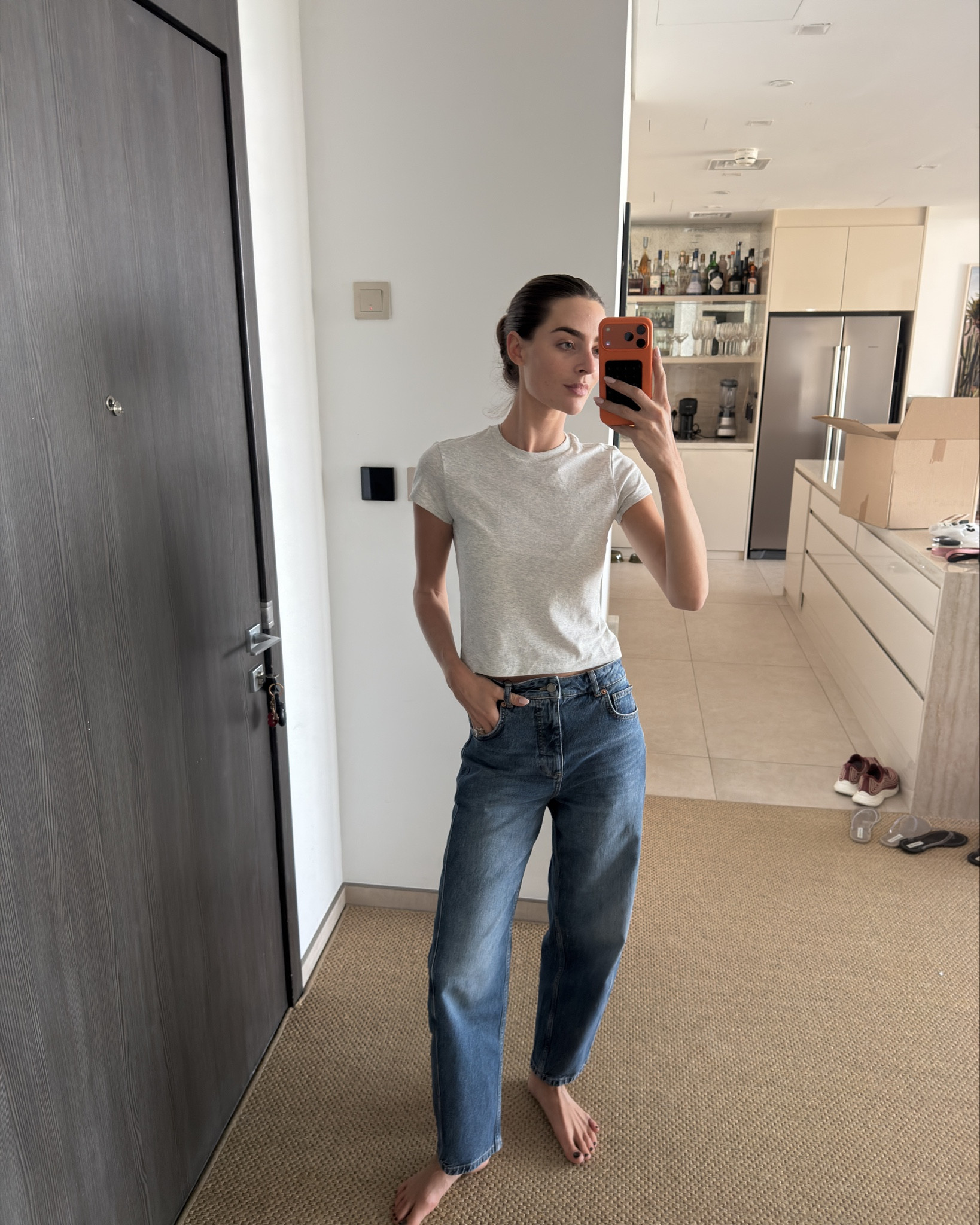 Skims shrunken T-shirt and barrel leg jeans 

#LTKFindsUnder100