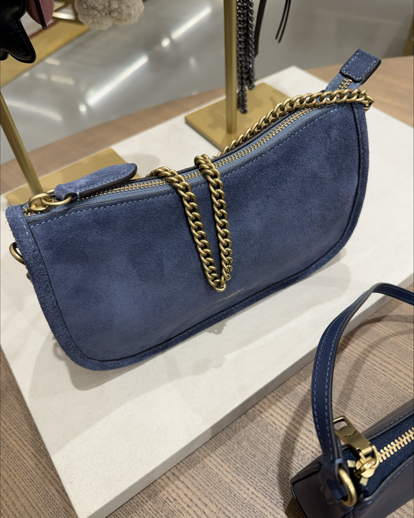 Saw this beautiful suede bag at Coach yesterday! This size is perfect and it comes with three strap large. This is a new color that was just released. $249

Detachable chain strap with 10.75" drop
Detachable short strap with 10.75" drop
Detachable long strap with 21.5" drop for shoulder or crossbody wear

Length: 9.5"
Height: 5.5"
Width: 3.25"

#LTKmomlife #LTKBeauty #LTKdayinmylife