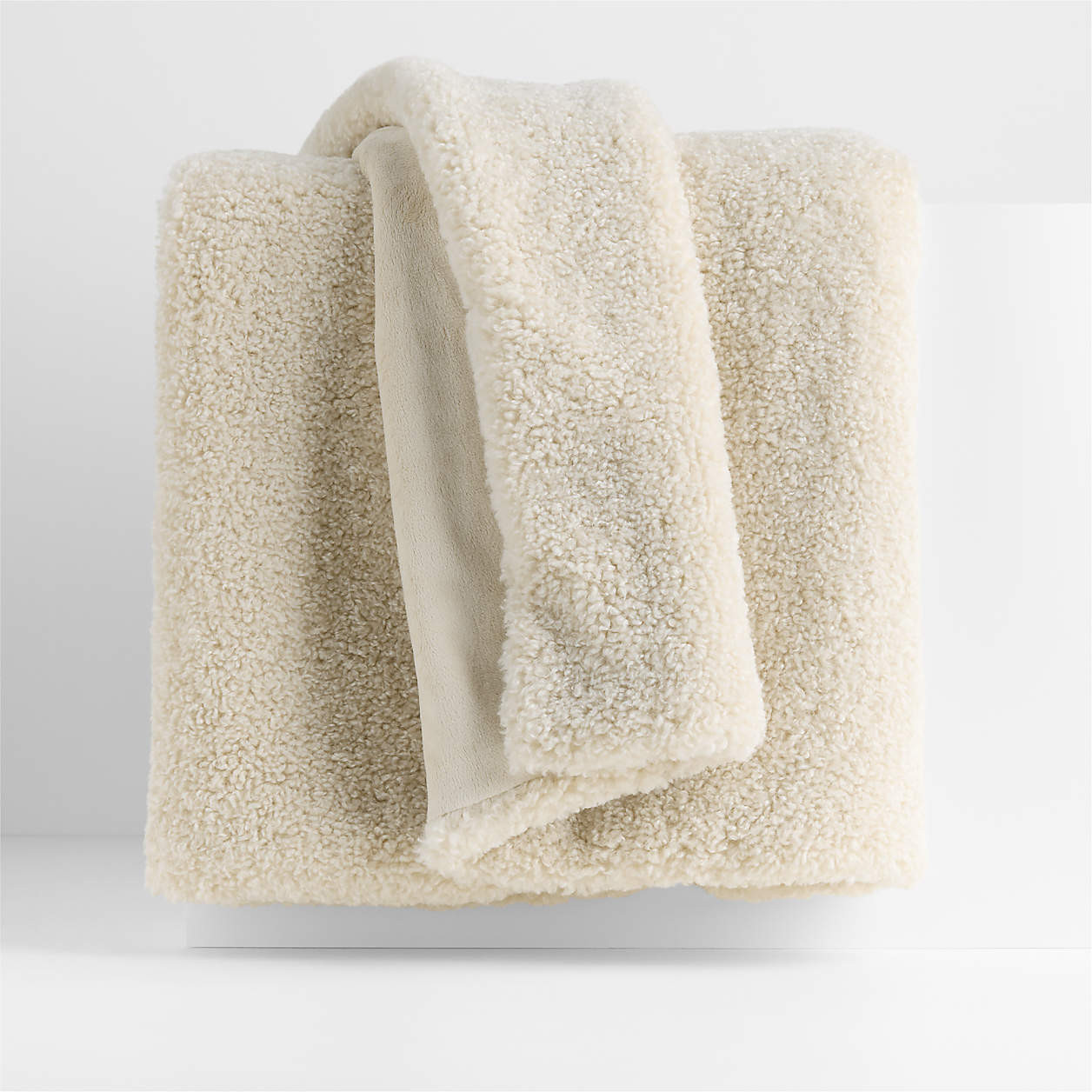 Faux Shearling 70"x55" Travertine Beige Throw Blanket + Reviews | Crate & Barrel | Crate & Barrel