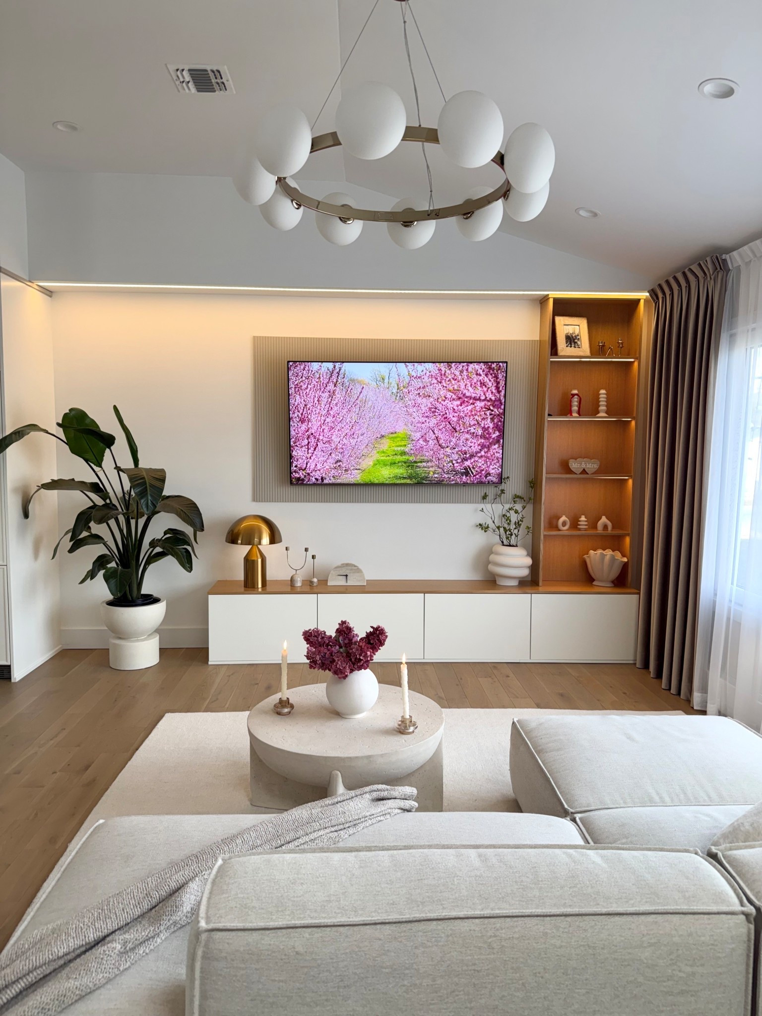 Sharing my living room views with you ✨

Modern living room idea, cozy vibes, brass chandelier, neutral interior 

#LTKHome #LTKdayinmylife #LTKstorytime