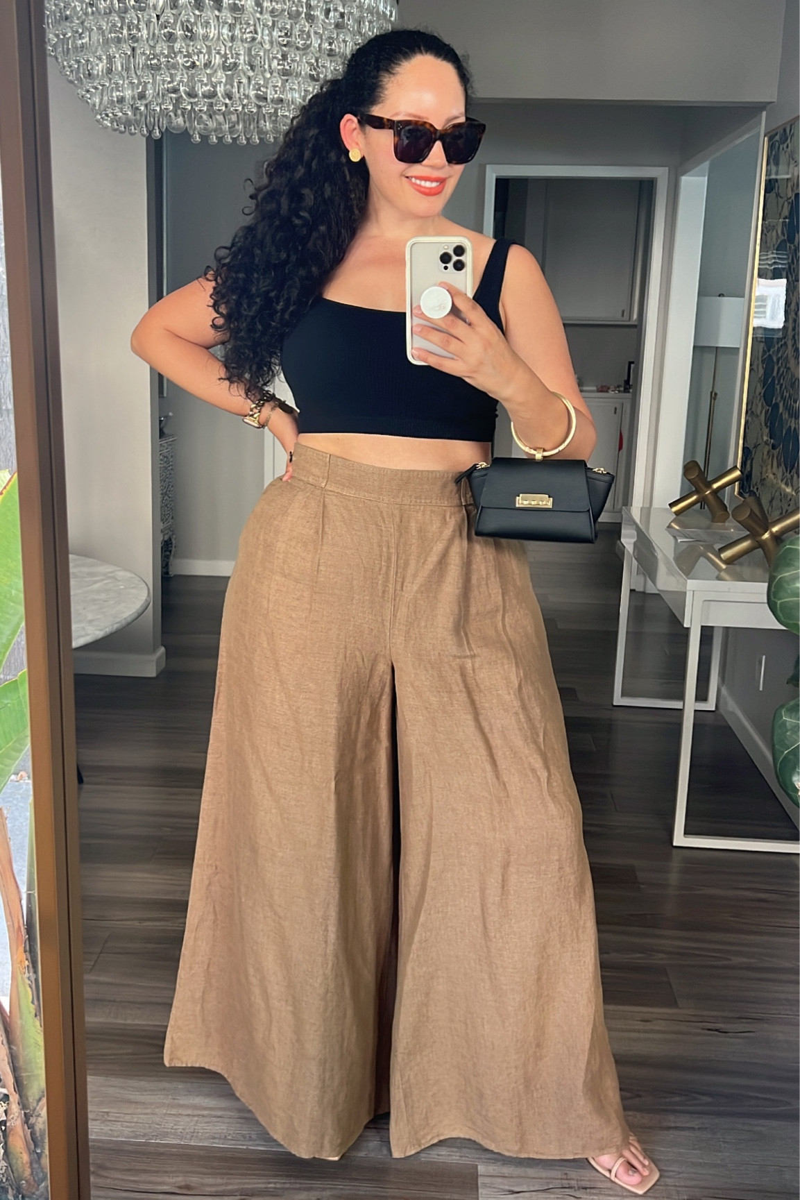 Black tank and ultra wide leg linen pant. 

Wearing size 16 pant, L top (both true to size). 

#LTKmidsize #LTKplussize #LTKstyletip