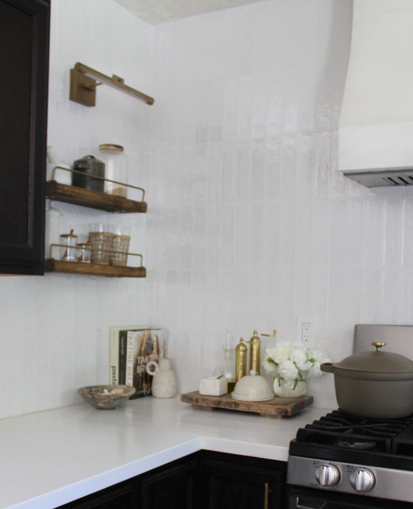 zellige tile look for less - ran vertically no spacers, butted raw edge tiles against each other for most minimal grout line, and white grout

kitchen decor. Kitchen styling. Organic modern decor. Wood tray. Wood riser  

#LTKStyleTip #LTKHome #LTKFindsUnder50