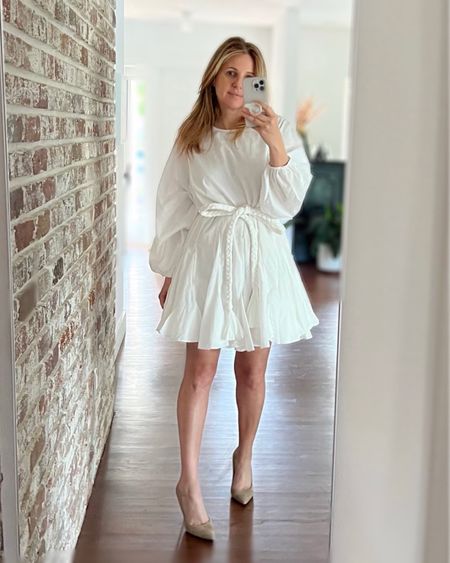 One of my favorite white dresses. I bought it for a birthday dinner and also have worn to luncheons and a graduation ceremony for my son. It’s an oversized fit n flare that has a tie waist to accent my figure. (Might be wearing this again to my daughter’s graduation too… looking for outfits now) I’m wearing it with a classic nude pump here.