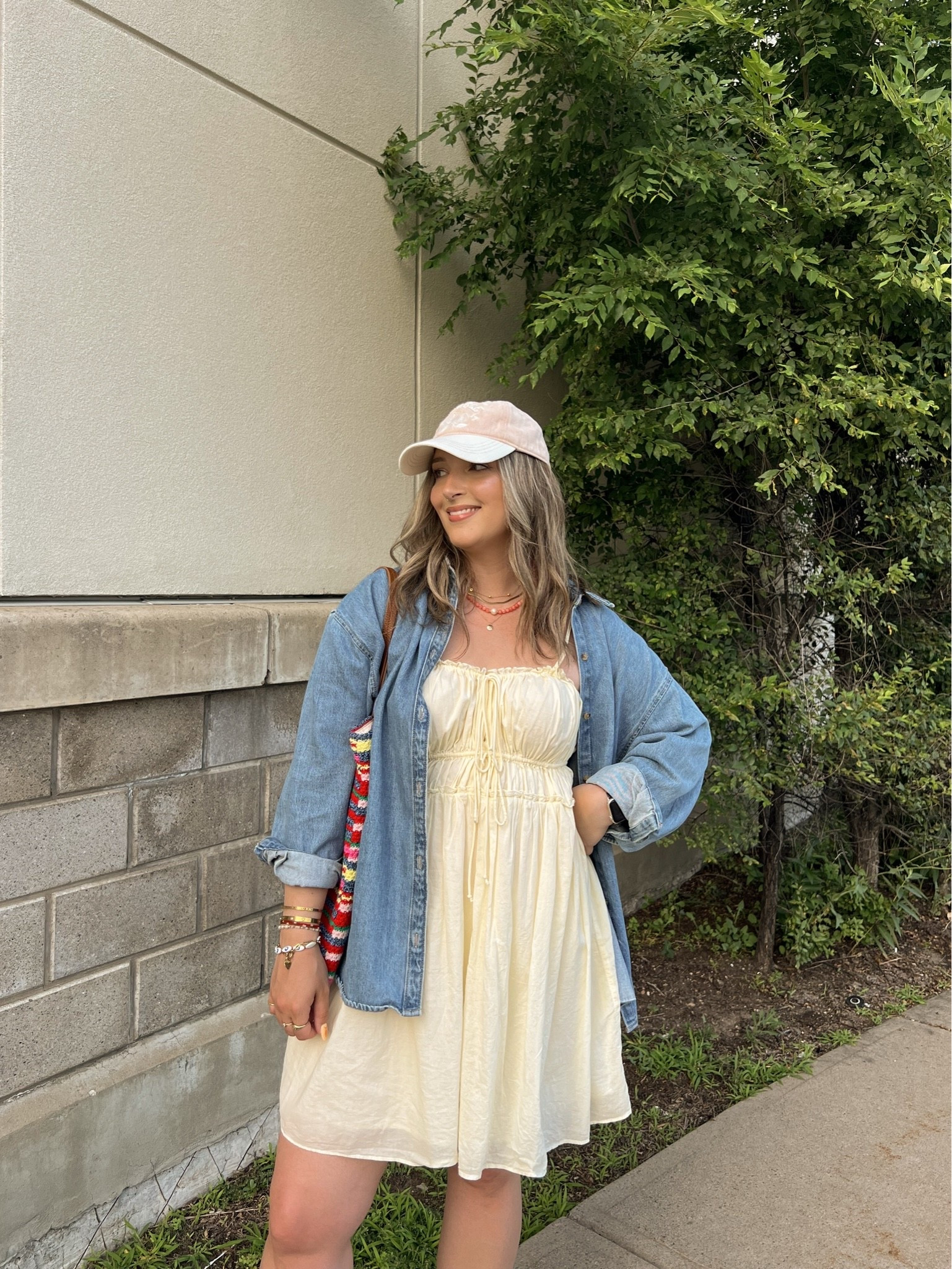 Easy summer outfit! My butter yellow dress is old from aerie, but I linked a super similar option! Wearing my usual size L in the denim shirt. Crocs sandals are super comfy, I’m a 9.5-10 shoe and wear a 10. Canadian shirt, sandals, and bag links are under “similar products”

#LTKsummer #LTKmidsize #LTKdresses