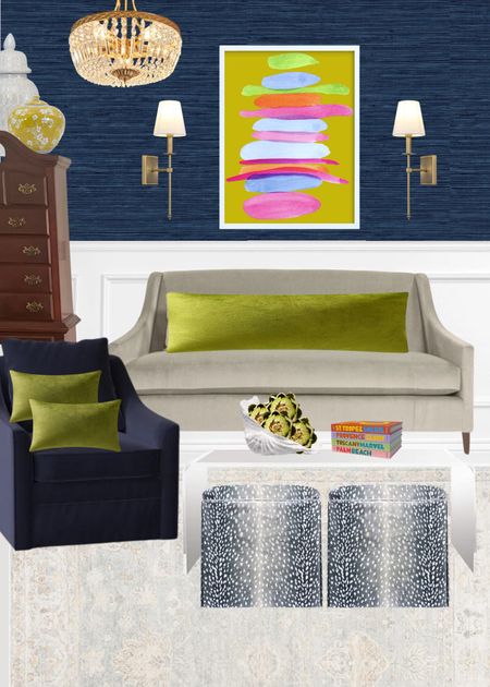 Bright and bold grandmillennial living room design, designed around existing velvet couch and chairs and chest of drawers. Royal blue sea grass wallpaper, minted art, budget amazon lighting, chartreuse velvet pillows, antelope slipcovered ottoman, acrylic coffee table from Amazon 