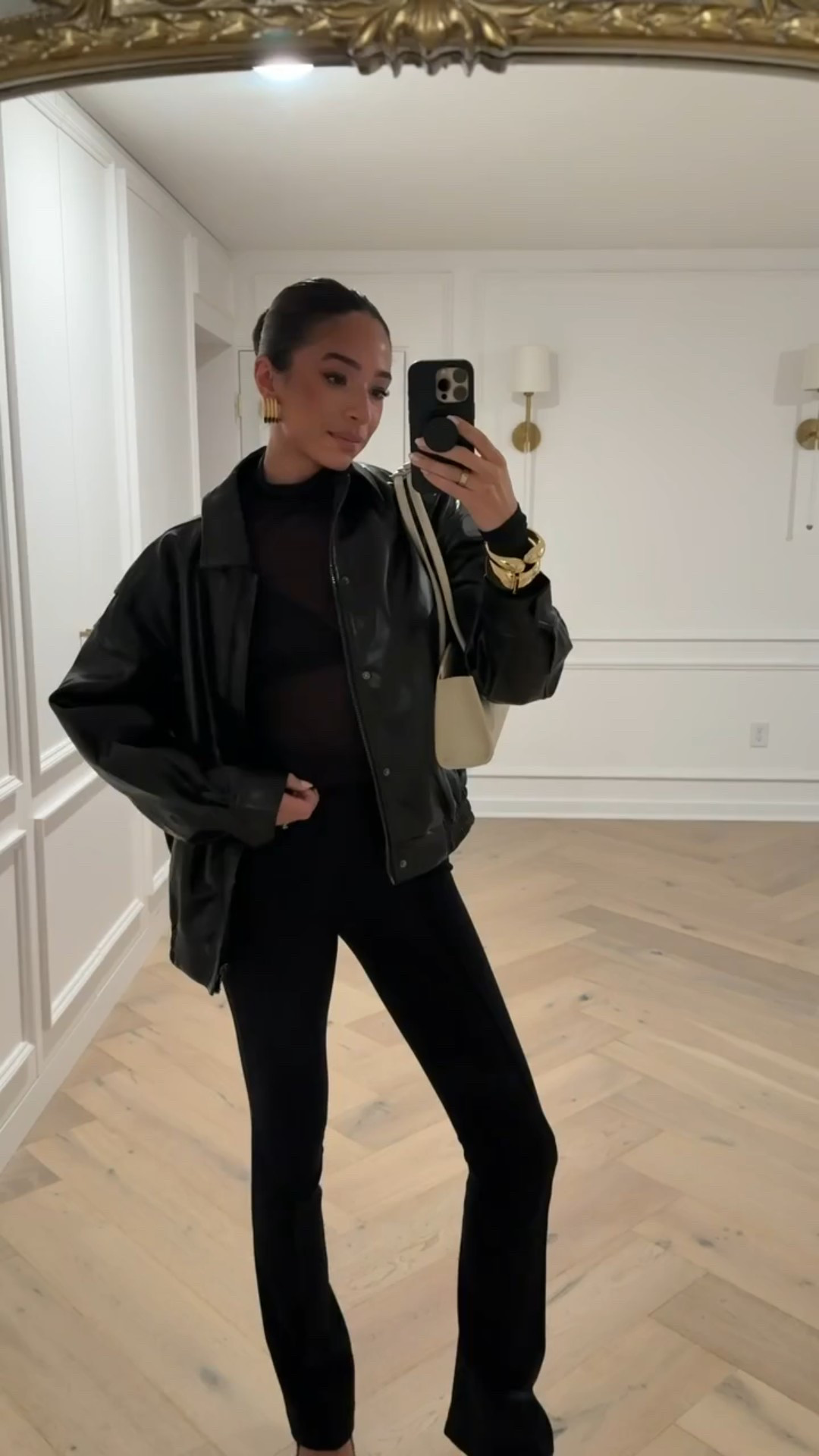 Winter date night outfit 🖤 wearing a S in faux leather bomber jacket, XS in sheer turtleneck top, XS in flare pants (pre-bump)

Winter fashion 
Leather jacket outfit 
Date night outfit 
Winter style 
Fashion over 30
Valentine’s outfit 

#LTKValentine #LTKSeasonal