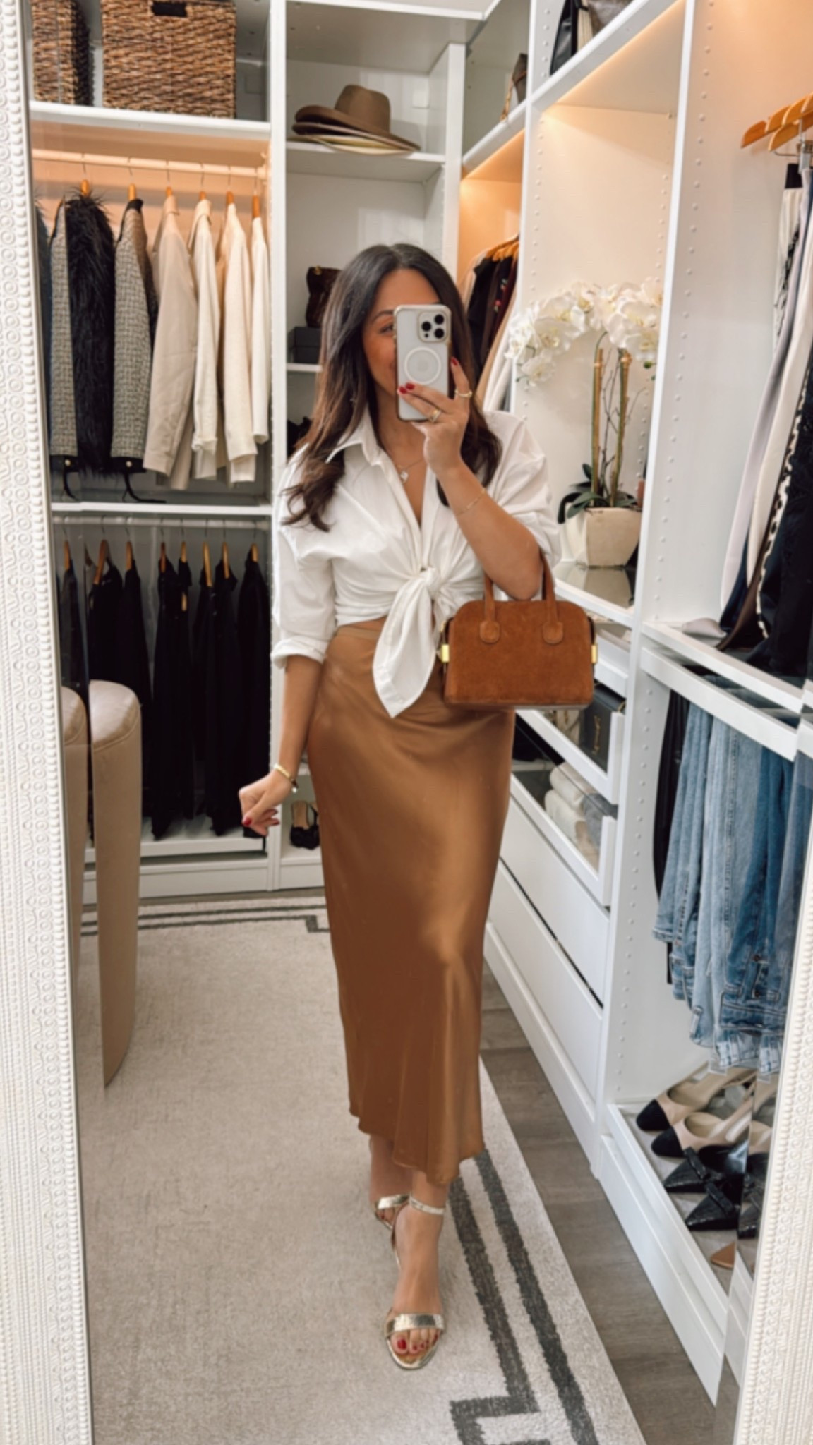 Slip skirt wearing an xs 
Shirt is a standard button- down tied in the front-linked a similar 

#LTKStyleTip #LTKOver40