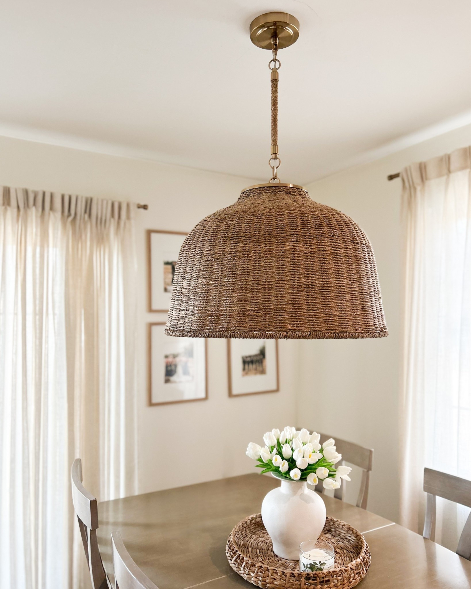 Neutral dining nook + some faux tulips for spring. 🌷

Amazon tulips, dining nook, light fixture, gallery wall 

#LTKStyleTip #LTKHome