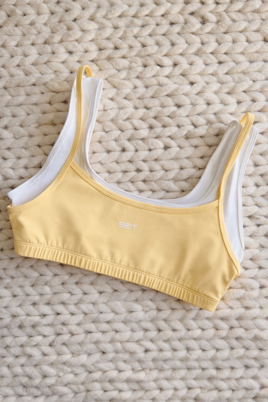 This beautiful butter yellow color is trending again for spring & this SET Active bra just confirmed it. The Breathe Hero Bra has this double layer detail with thick under straps & thin outer straps that looks so intentional & elevated. Lightweight fabric, medium compression, & a fit that actually looks cute on. I wear a small. Linked in my LTK!

SET Active - SET Active bra - Breathe Hero Bra - butter yellow - butter yellow activewear - spring activewear - spring workout outfits - sports bra - cute sports bra - workout sets - workout bra - gym fits - gym style - women’s fitness - activewear style - activewear sets - athleisure - athleisure outfits - spring gym outfits - women’s workout clothes - fitness fashion - athletic wear women - biker shorts set - sports bra & shorts - workout outfit inspo - spring fashion 2026 - new activewear - limited edition activewear - SET Active outfit - pilates outfit - yoga outfit - running outfit - cute gym clothes

#LTKActive #LTKU #LTKfitnessgoals