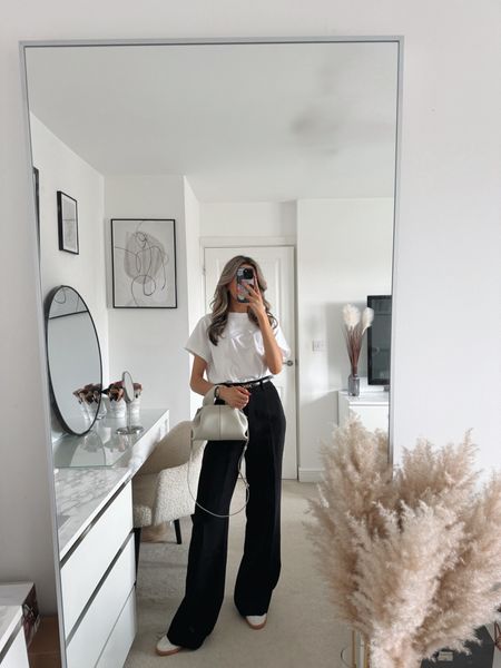 Oversized white tshirt, black wide leg trousers, adidas trainers, spring outfit, casual outfit, capsule wardrobe. 

#LTKeurope #LTKSeasonal #LTKstyletip
