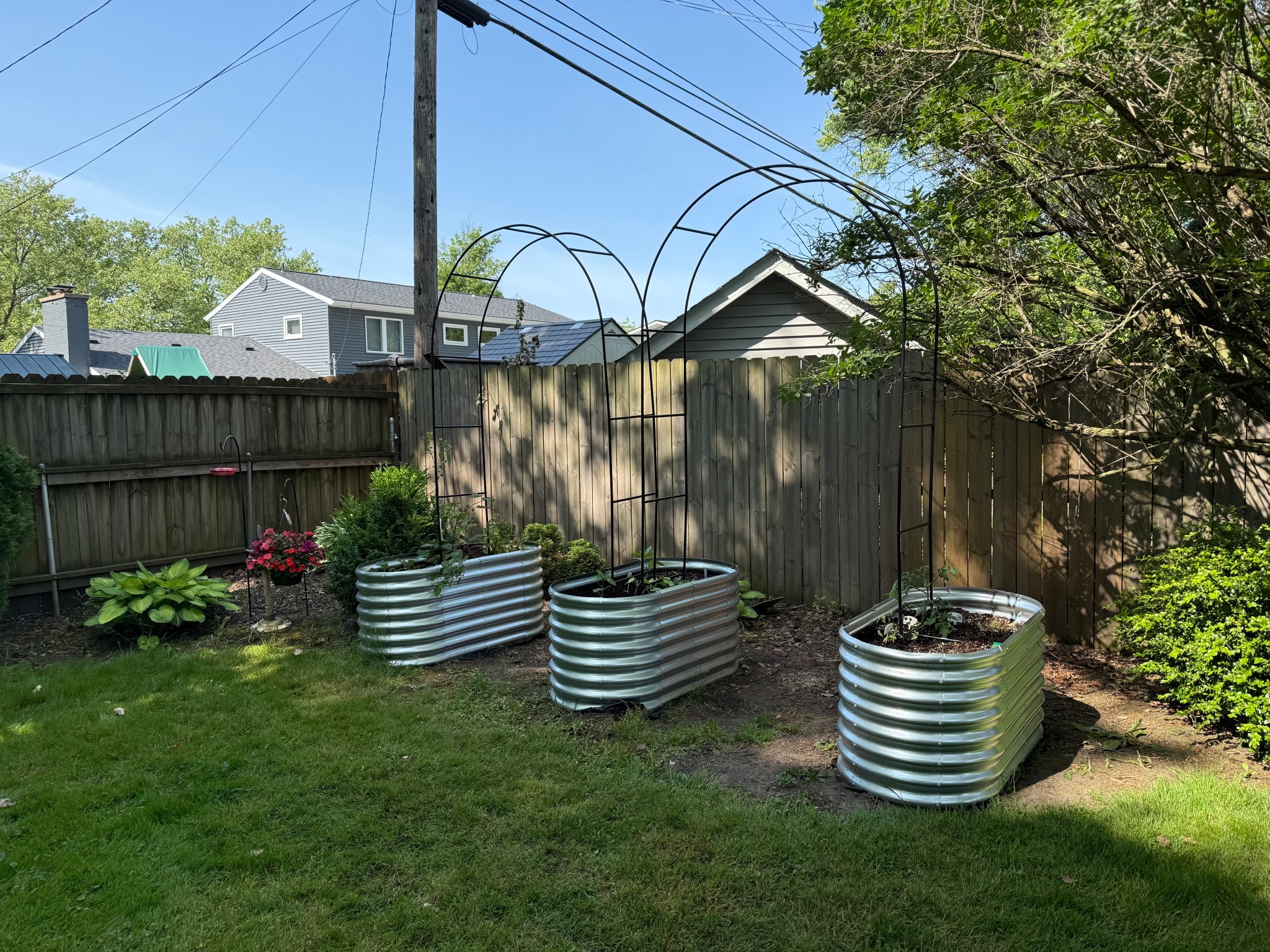 Arched trellis for raised garden beds 
#garden #gardening #homegarden

#LTKHome #LTKSummerEdit