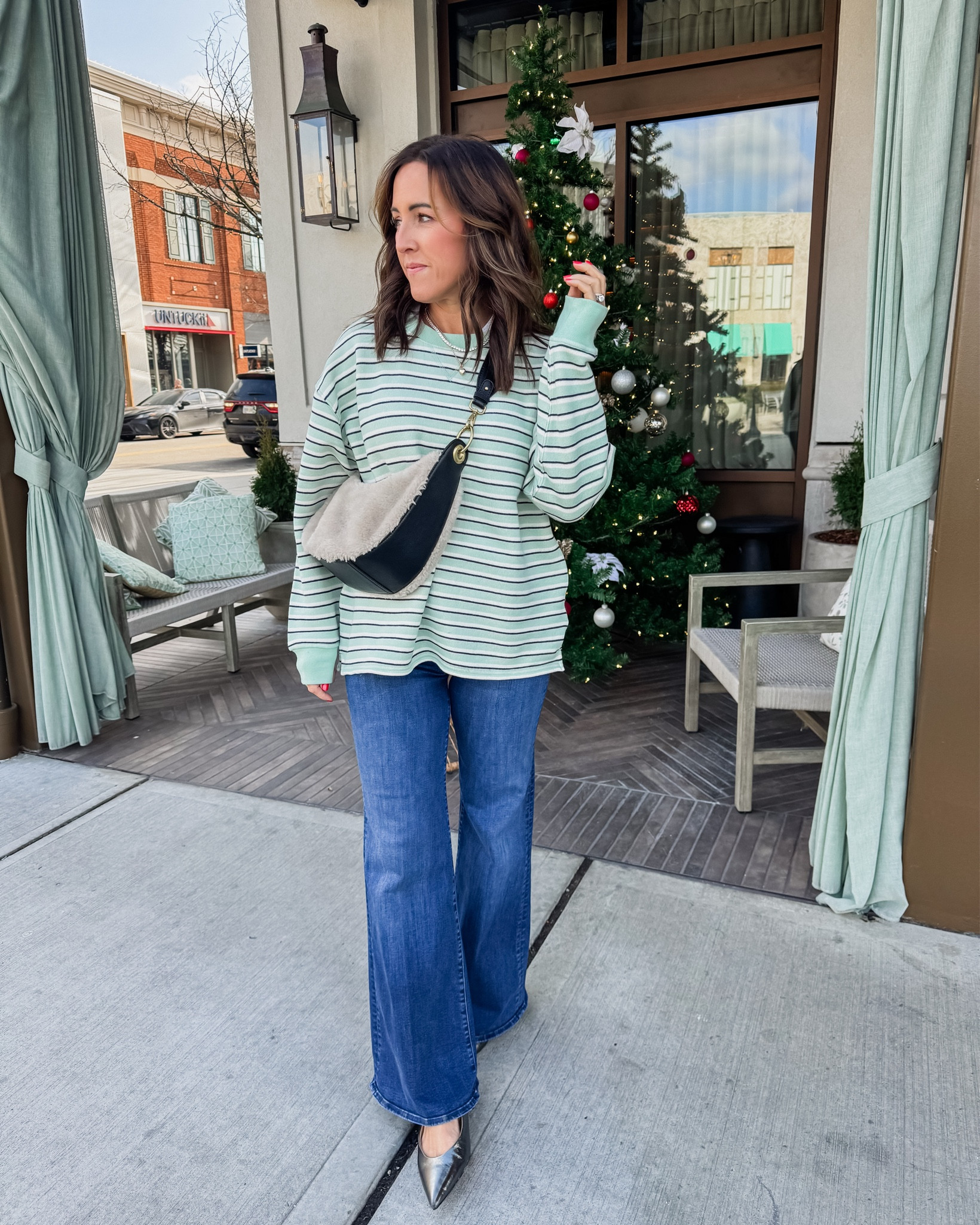 Outfit of the day. Holiday shopping. Winter style. 
S sweatshirt 
Jeans tts in petite here 

#LTKHoliday #LTKOver40 #LTKSeasonal