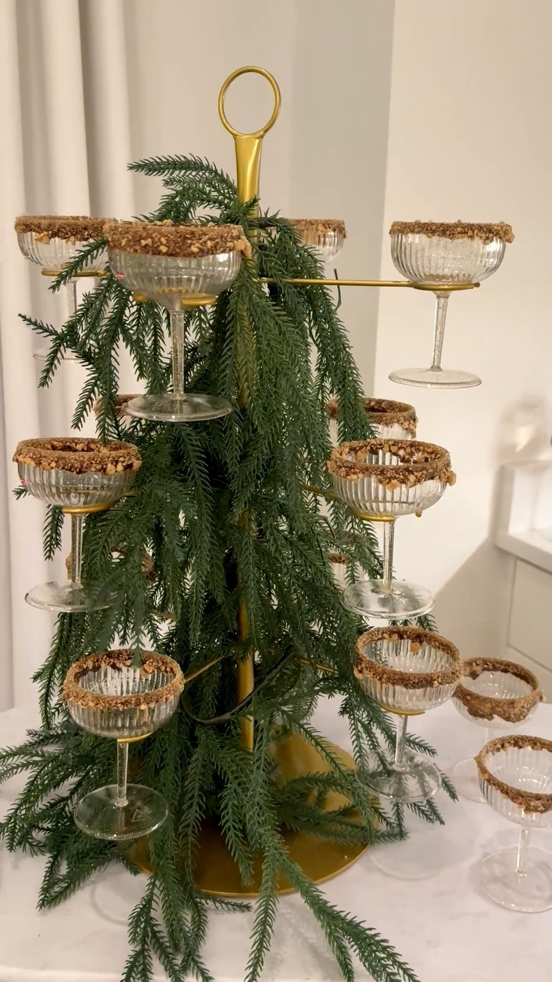 Holiday drink tree! Perfect for new years too!!! And these gold sparkle plastic Target glasses are perfect for champagne or cocktails!!
#hosting #christmas #newyears

#LTKHoliday #LTKFindsUnder50