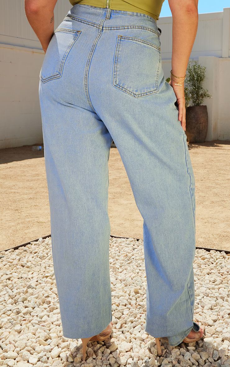 Plus Light Wash Split Hem Jeans | PrettyLittleThing US