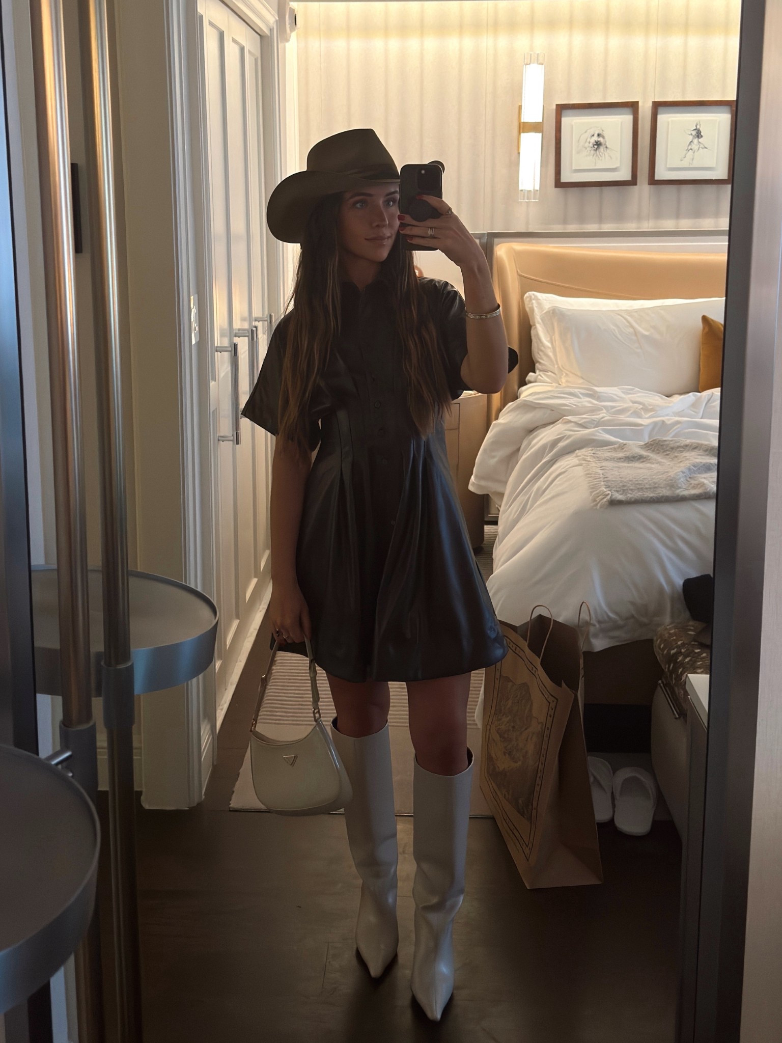Aspen outfit
Anthropologie leather mini dress: wearing an XXS