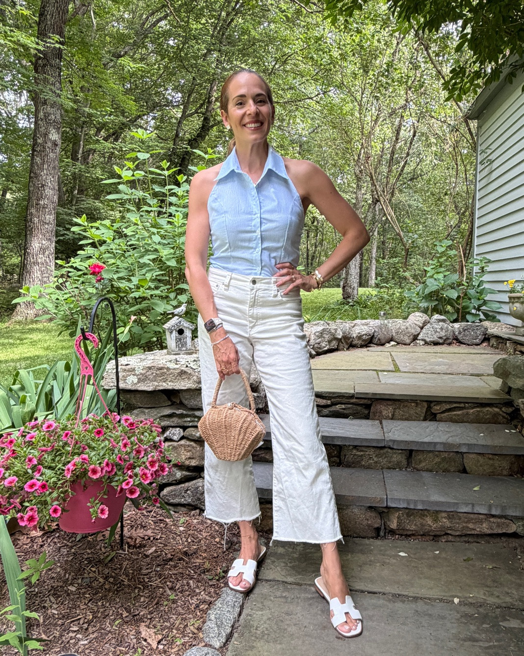 Loving this blue and white striped button up halter top with a collar - so on trend and coastal while also being formal! I’m wearing these raw hem wide leg high waisted white jeans so much this spring and summer! Linked my cute shell straw bag and designer inspired sandals too 🩵🤍🐚🌊

#LTKootd #LTKSeasonal #LTKWorkwear