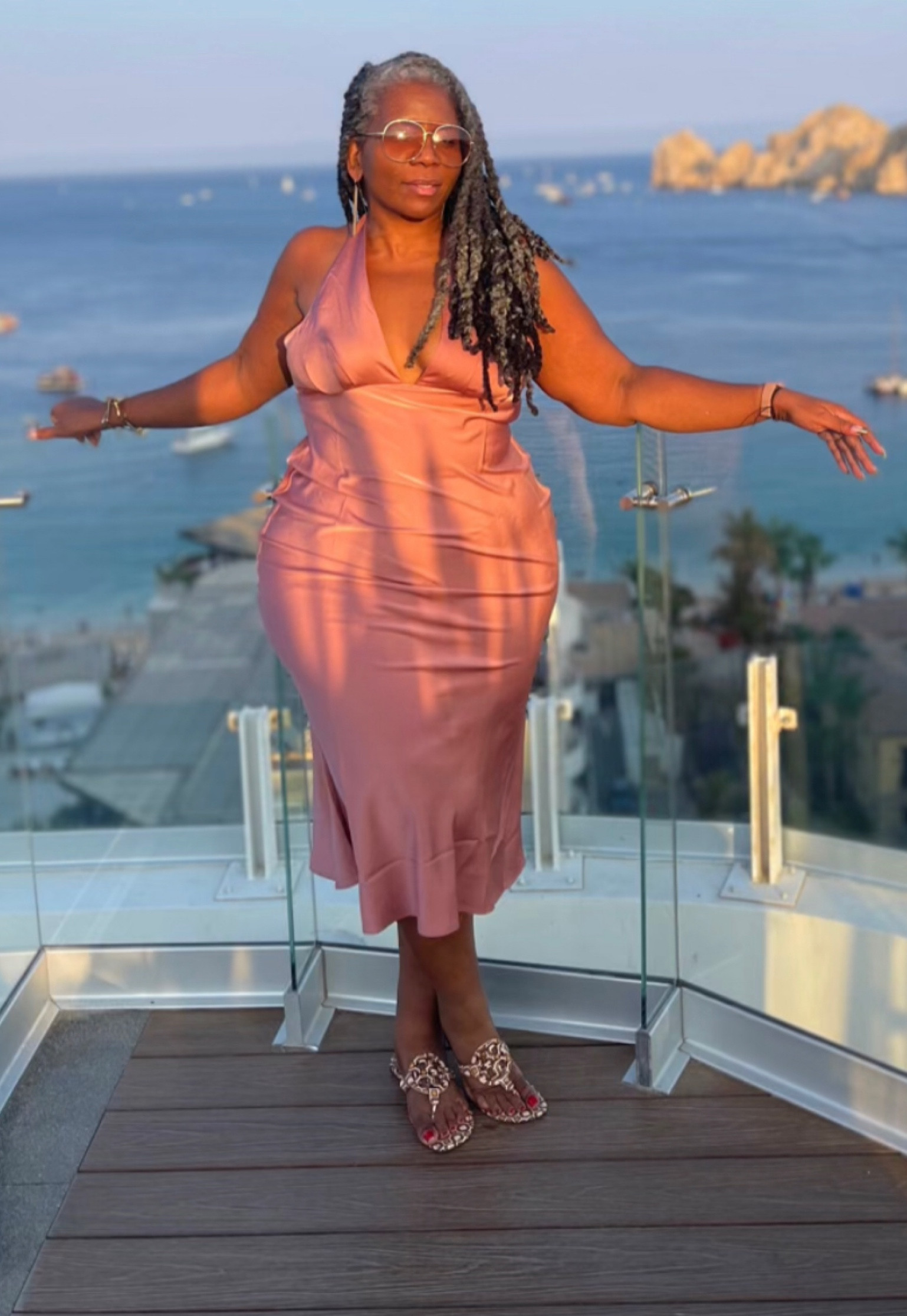 Satin racerback midi dress from ASOS - $31.50. This dress comes in brown (shown), ivory, wine, and chartreuse and is a steal at under $50. Paired with Tory Burch Miller Sandals for an easy travel look.

#LTKtravel #LTKcurves #LTKunder50