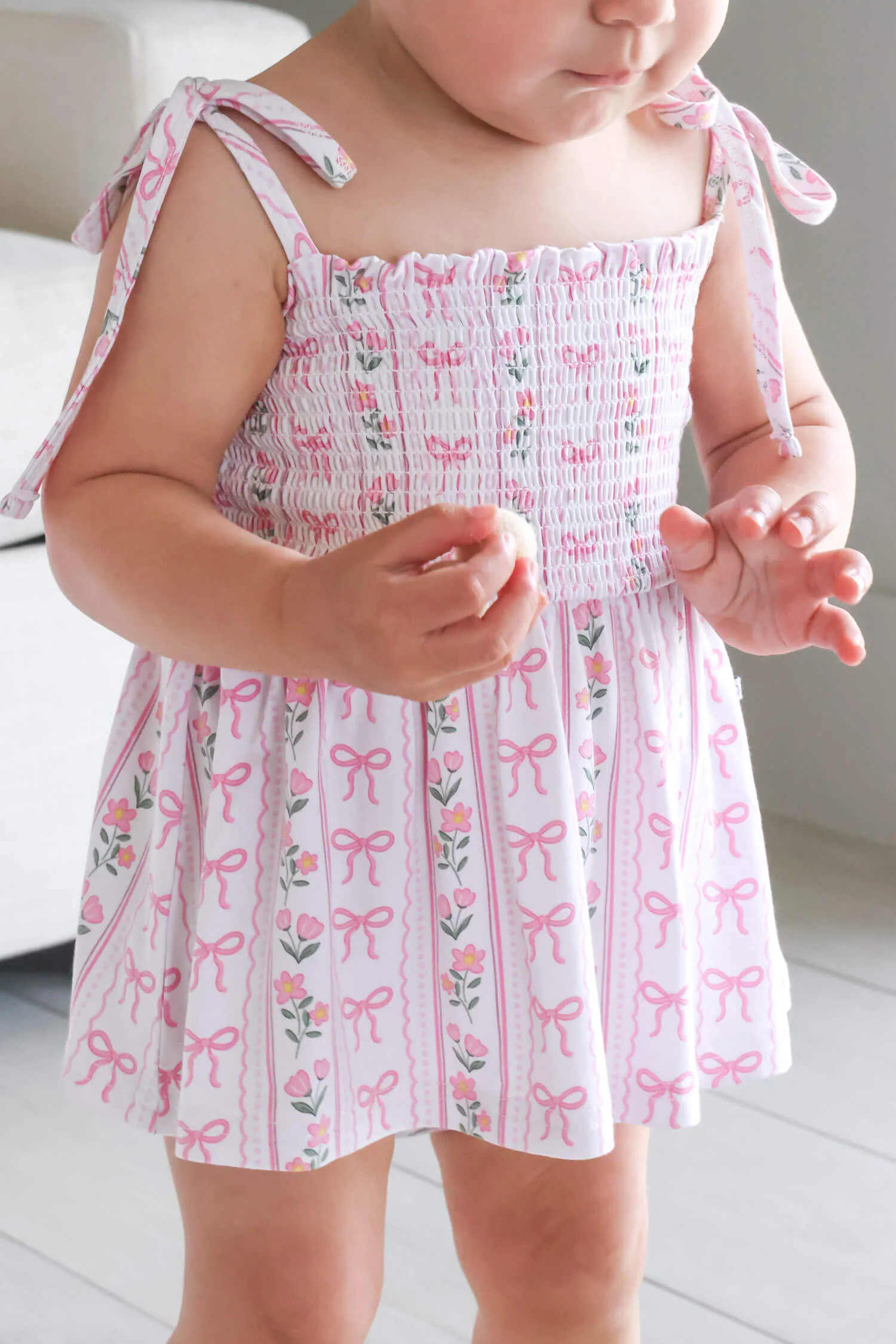Smocked Twirl Bodysuit | Coquette Garden | Caden Lane