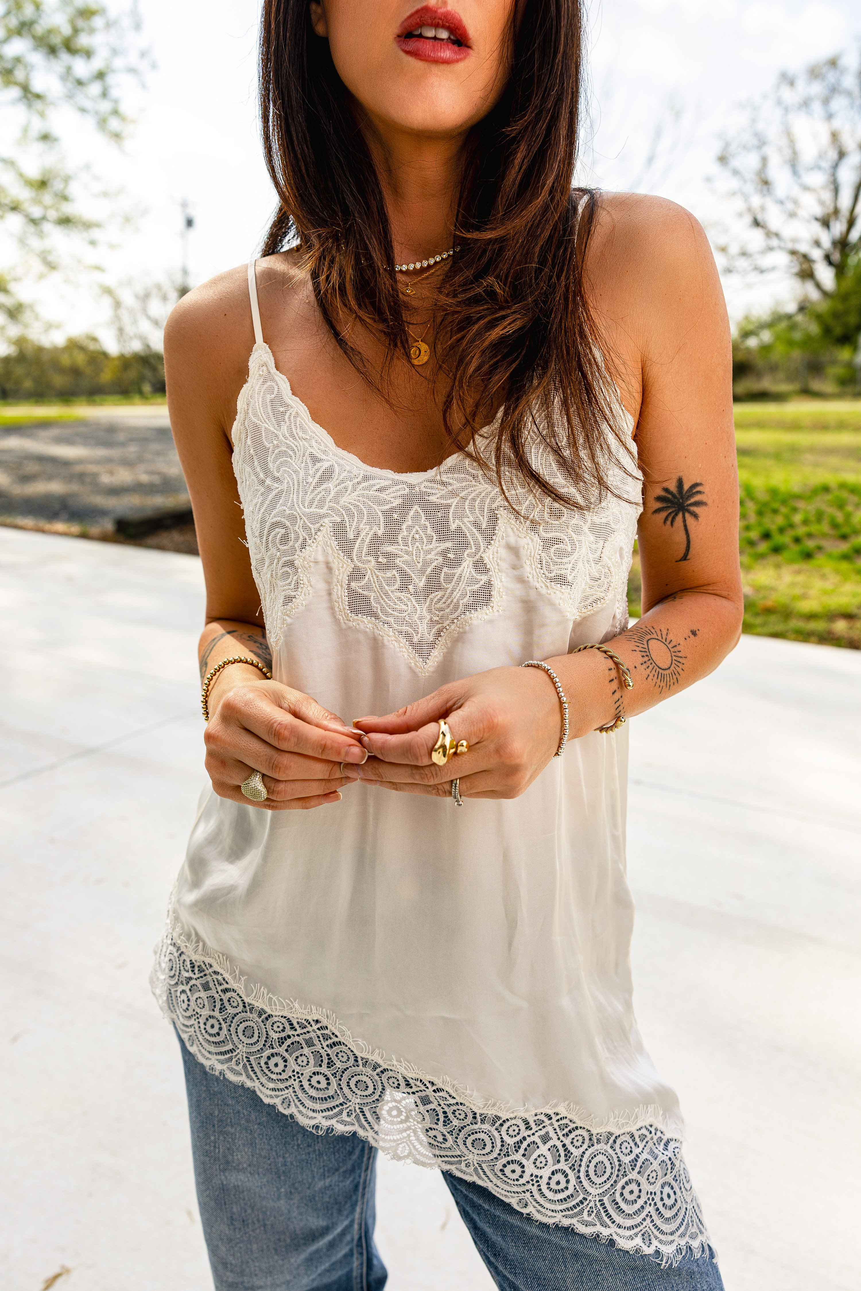 Stunning asymmetrical lace top! Wearing the small 

#LTKFestival #LTKgrwm #LTKootd