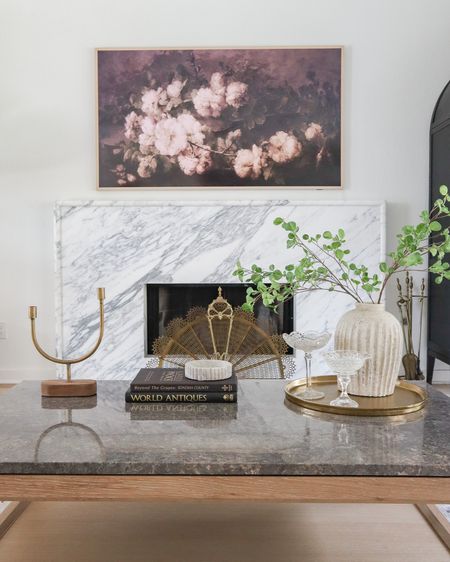 Coffee table decor and styling! The round gold tray is currently 20% off with Target circle!

candleholder, Frame TV, Pottery Barn vase, coffee table books 

#LTKstyletip #LTKhome #LTKsalealert