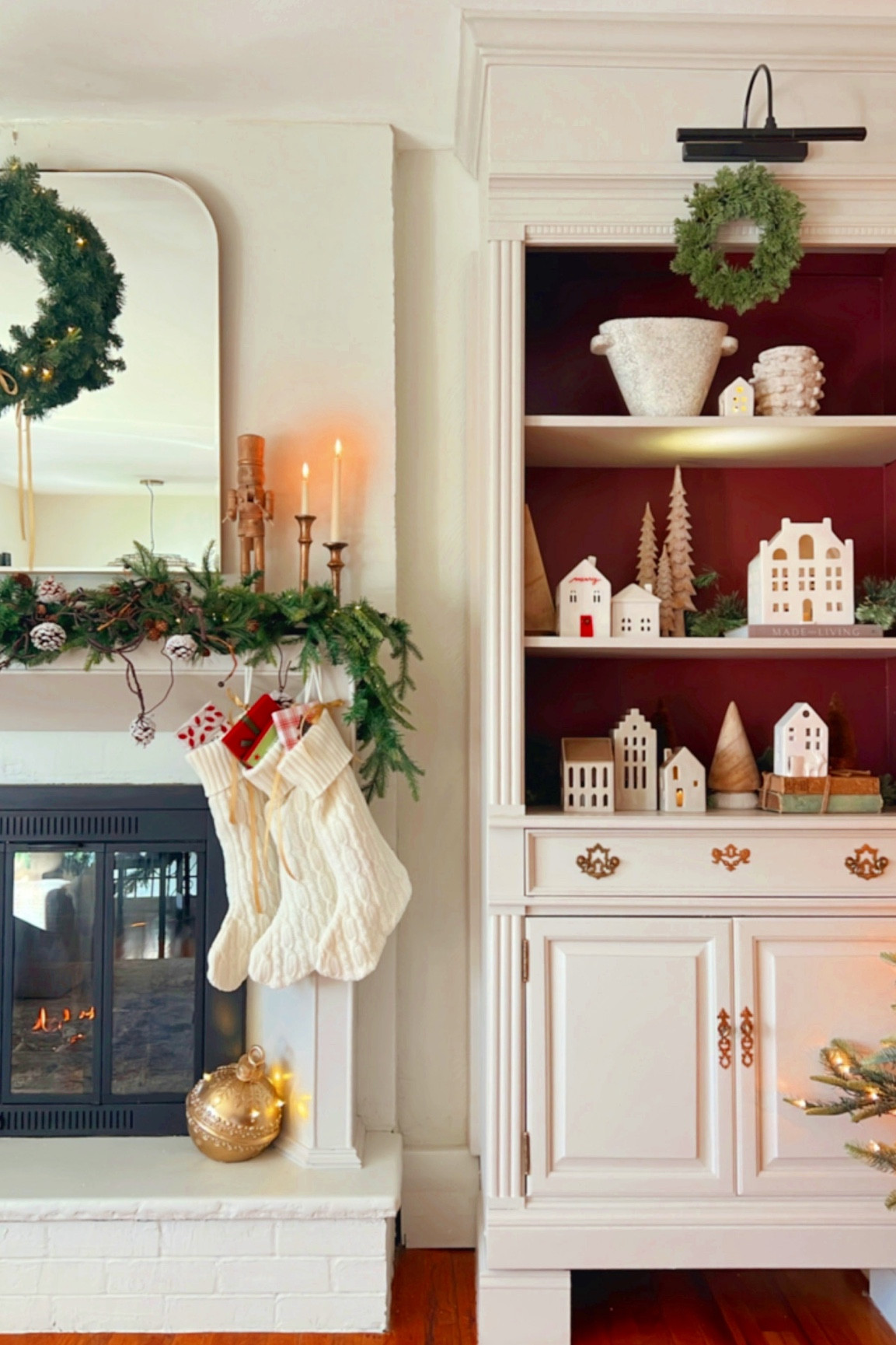 I am so happy to see this DIY Bookshelves dressed for the Holidays! I went for my ceramic house collection, added some ornaments around, mini lights and garland and they look amazing in my living room  

#LTKhome #LTKstyletip #LTKHoliday