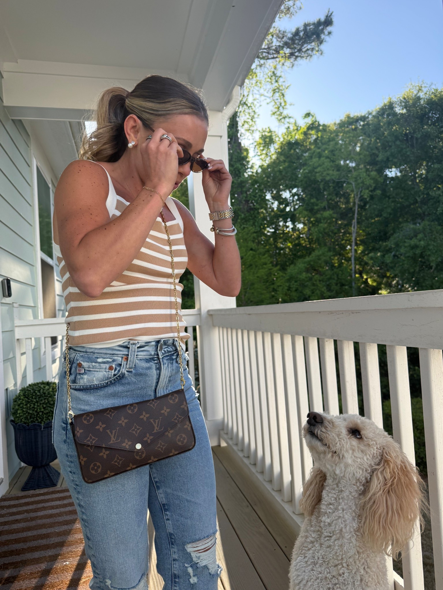 Jake trying to get a cute candid ;) 
Tank is from a local boutique in Oh, (Mustard Seed). 